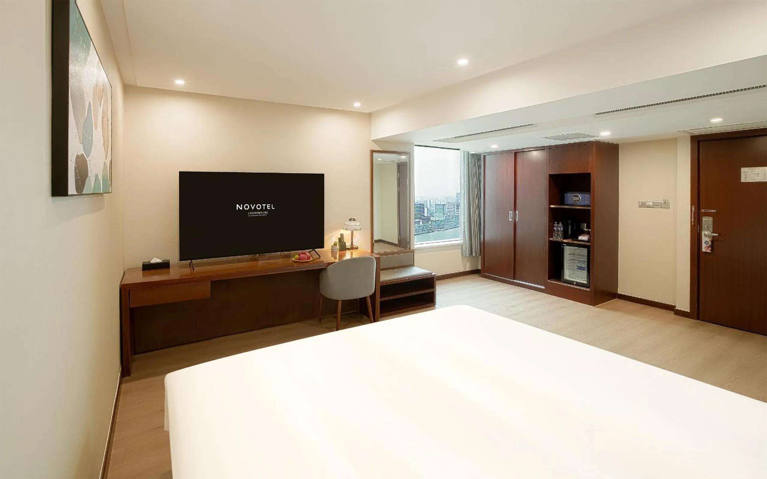 Bed in Novotel Atlantis Shanghai - Enjoy our great-valued breakfast in our rooftop revolving restaurant with a stunning river view & utilize our FREE self-serviced laundry
