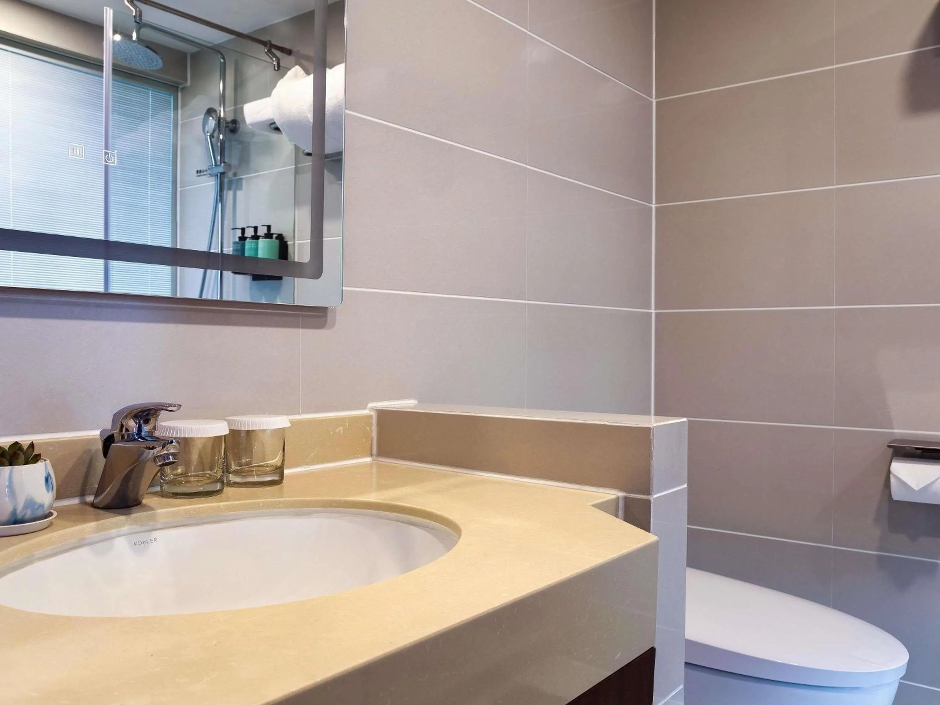 Bedroom in Novotel Atlantis Shanghai - Enjoy our great-valued breakfast in our rooftop revolving restaurant with a stunning river view & utilize our FREE self-serviced laundry