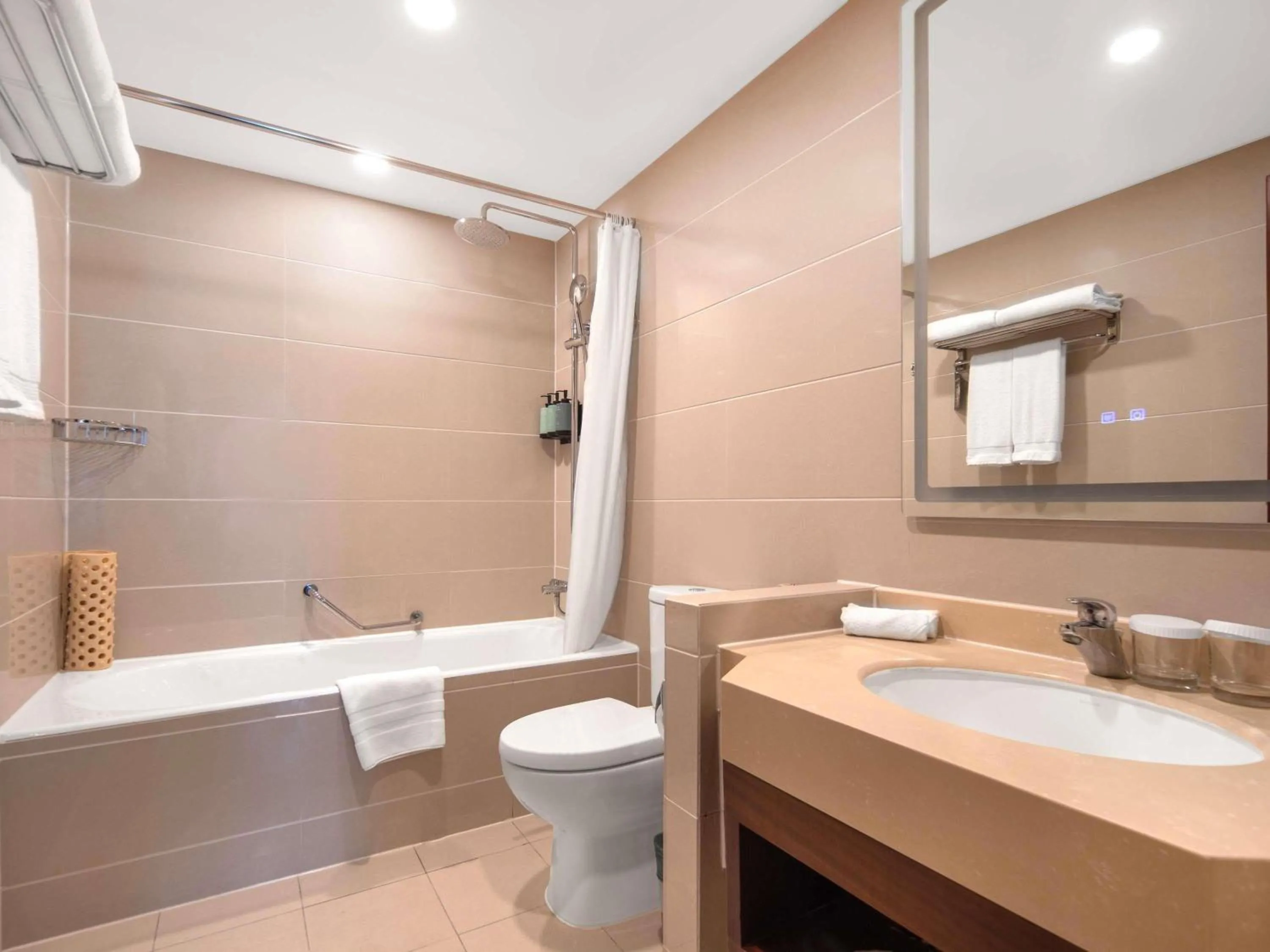 Bedroom in Novotel Atlantis Shanghai - Enjoy our great-valued breakfast in our rooftop revolving restaurant with a stunning river view & utilize our FREE self-serviced laundry