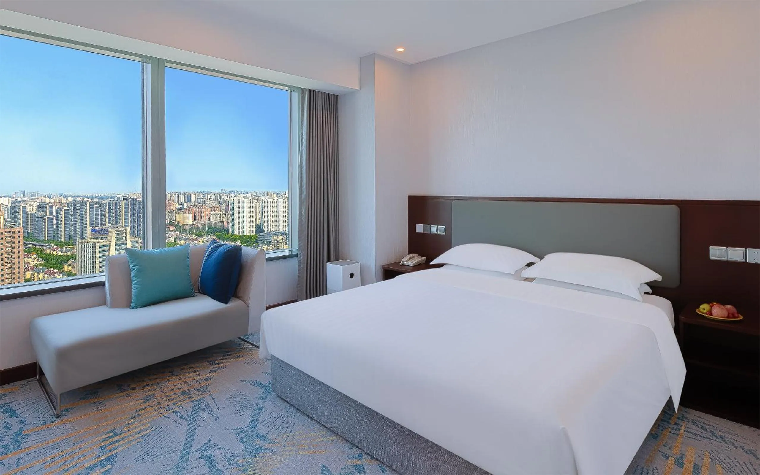 Bed in Novotel Atlantis Shanghai - Enjoy our great-valued breakfast in our rooftop revolving restaurant with a stunning river view & utilize our FREE self-serviced laundry
