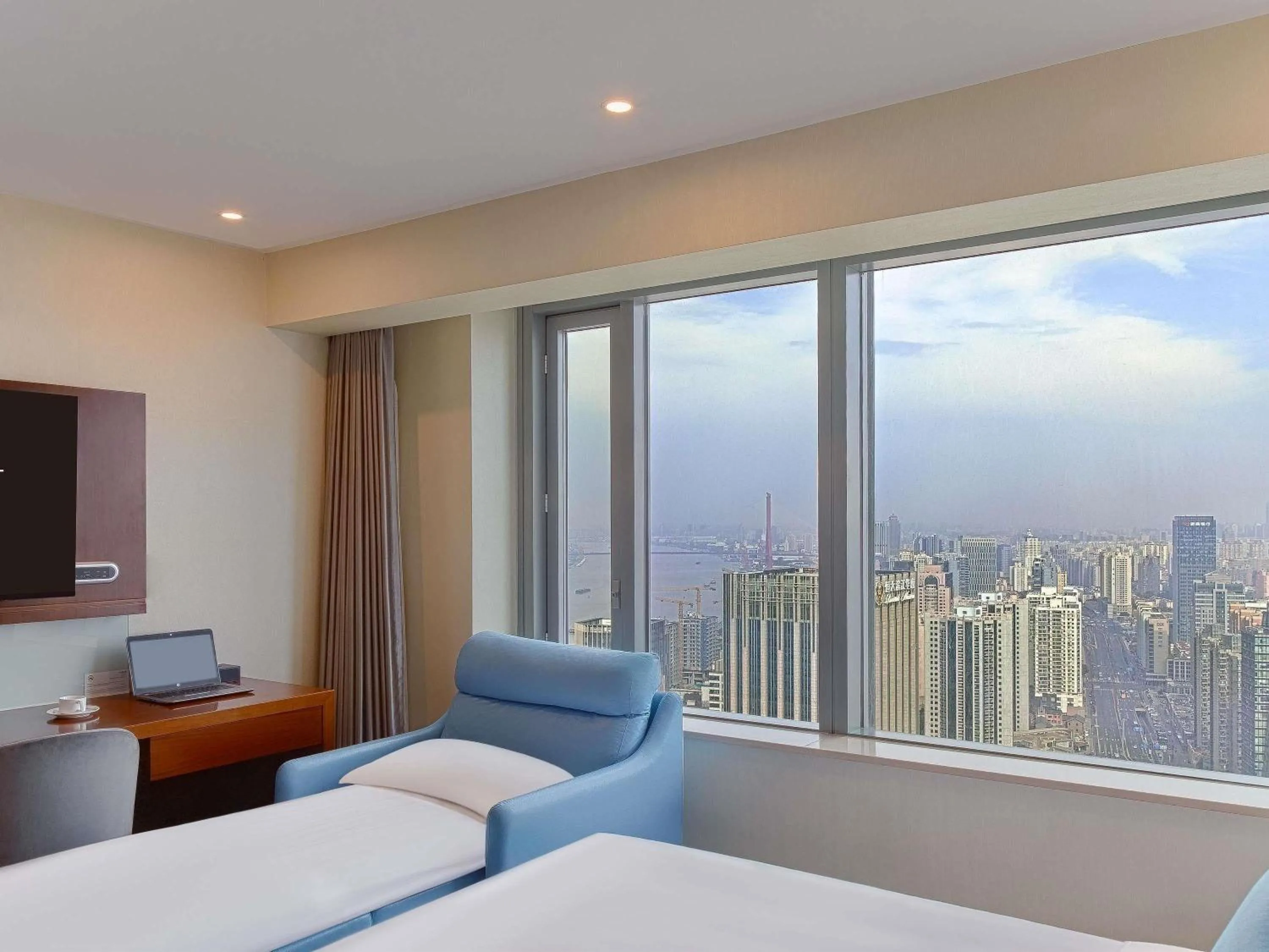 Bedroom, Bed in Novotel Atlantis Shanghai - Enjoy our great-valued breakfast in our rooftop revolving restaurant with a stunning river view & utilize our FREE self-serviced laundry