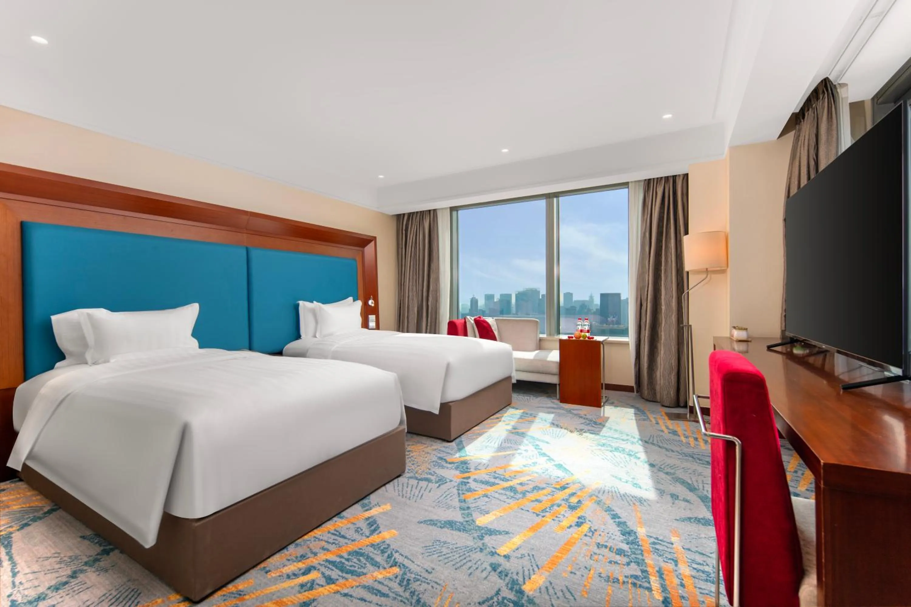 Bed in Novotel Atlantis Shanghai - Enjoy our great-valued breakfast in our rooftop revolving restaurant with a stunning river view & utilize our FREE self-serviced laundry