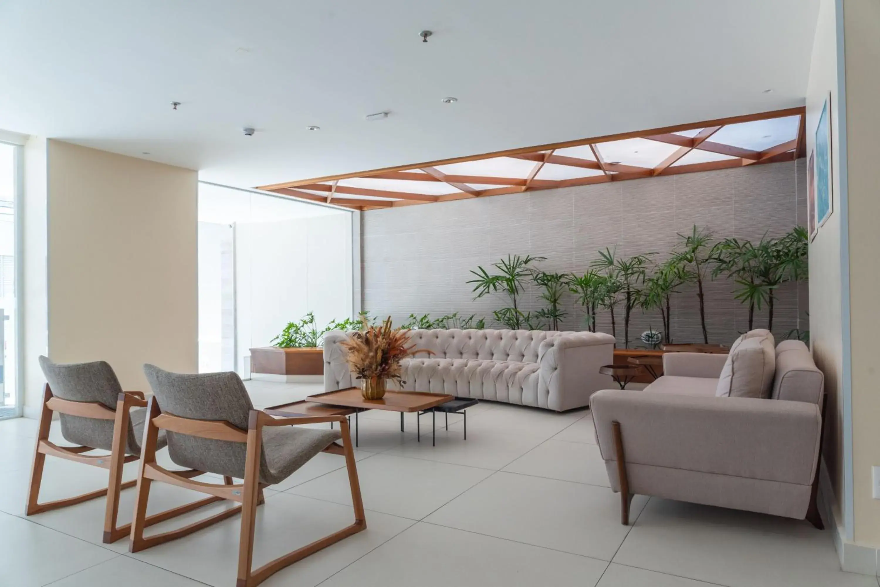 Living room in Verano Pajuçara by Tropicalis Living room in Verano Pajuçara by Tropicalis