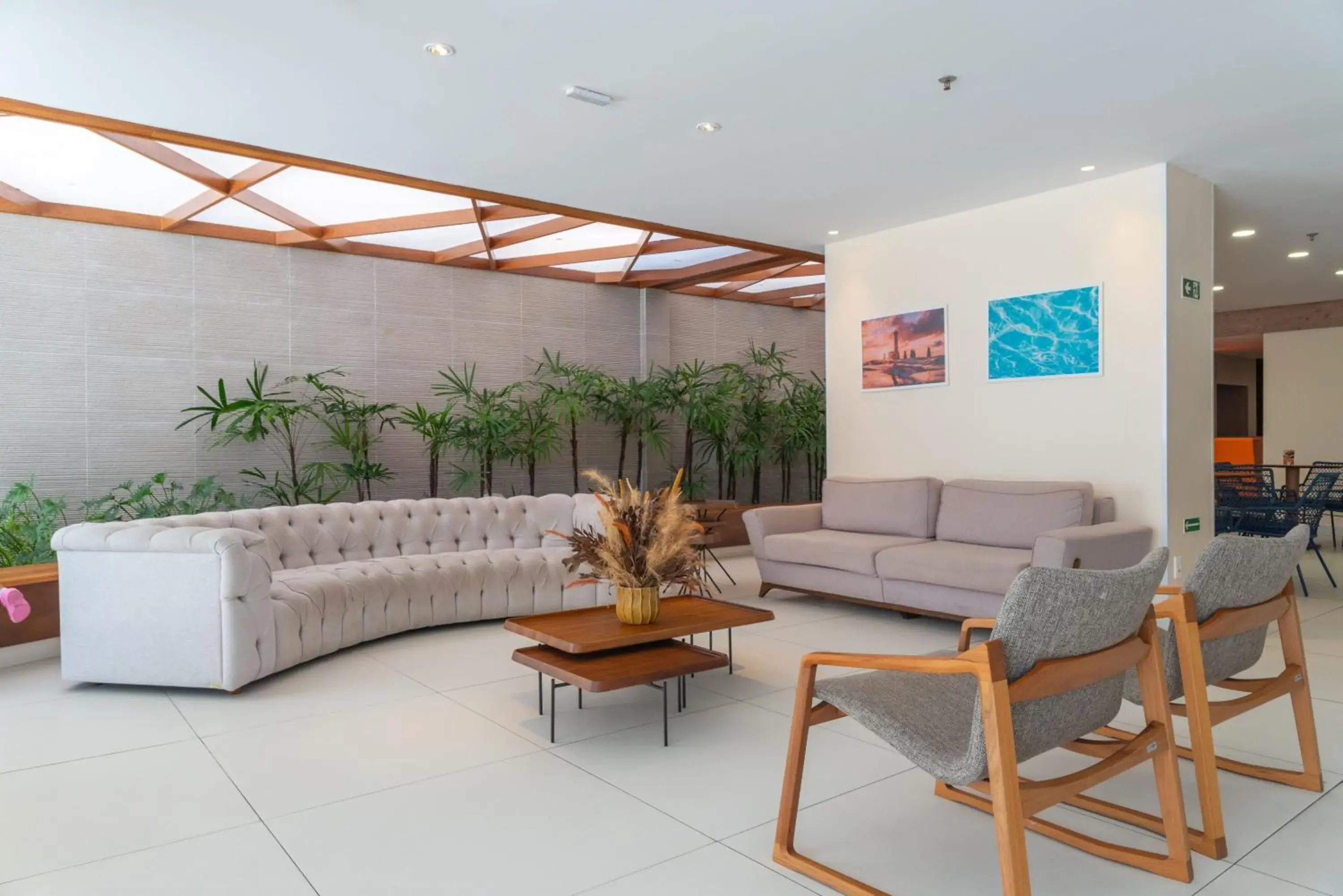 Living room in Verano Pajuçara by Tropicalis Living room in Verano Pajuçara by Tropicalis