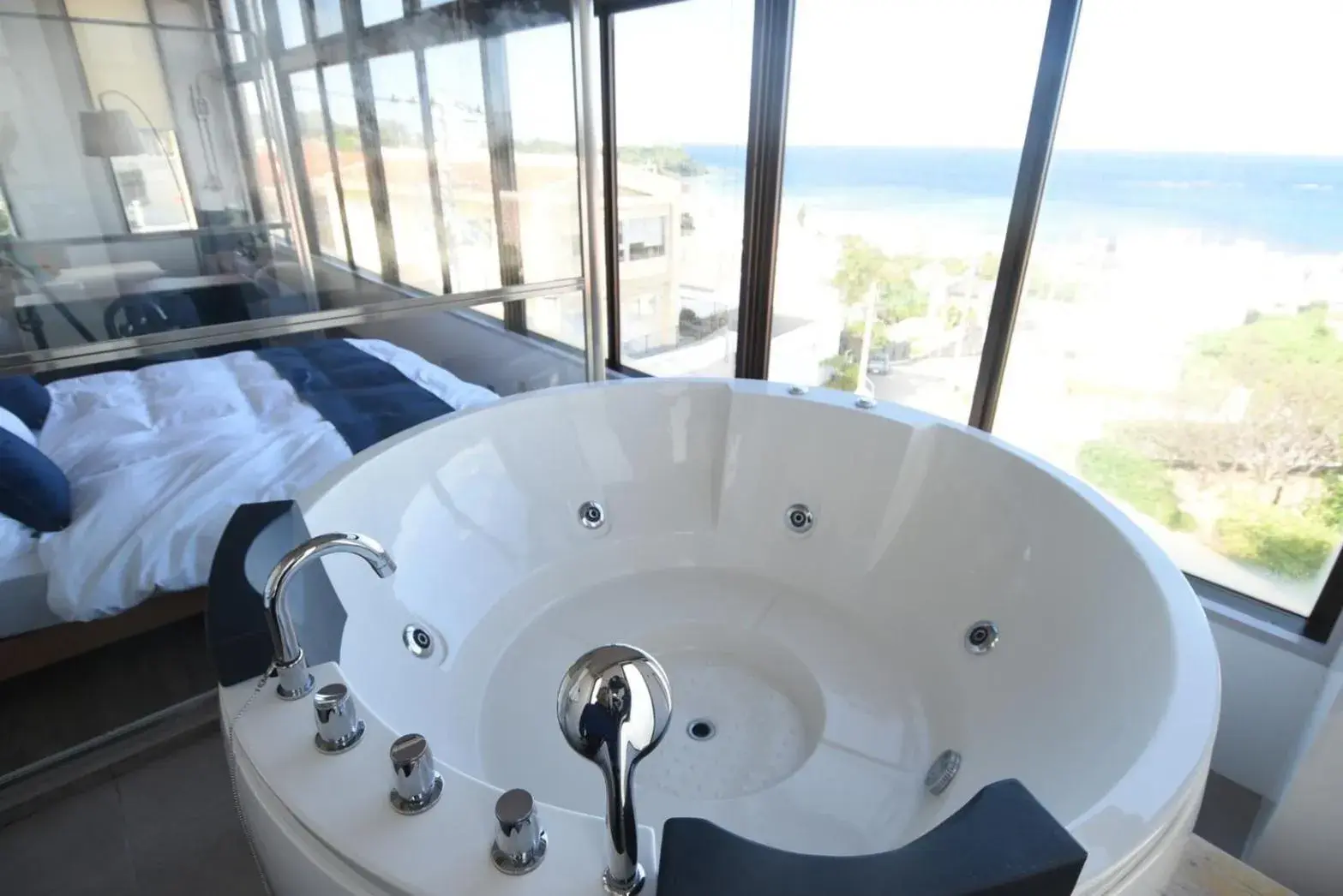 Bed in FIRST STREET Okinawa Yomitan-son Oceans -SEVEN Hotels and Resorts- Bed in FIRST STREET Okinawa Yomitan-son Oceans -SEVEN Hotels and Resorts-