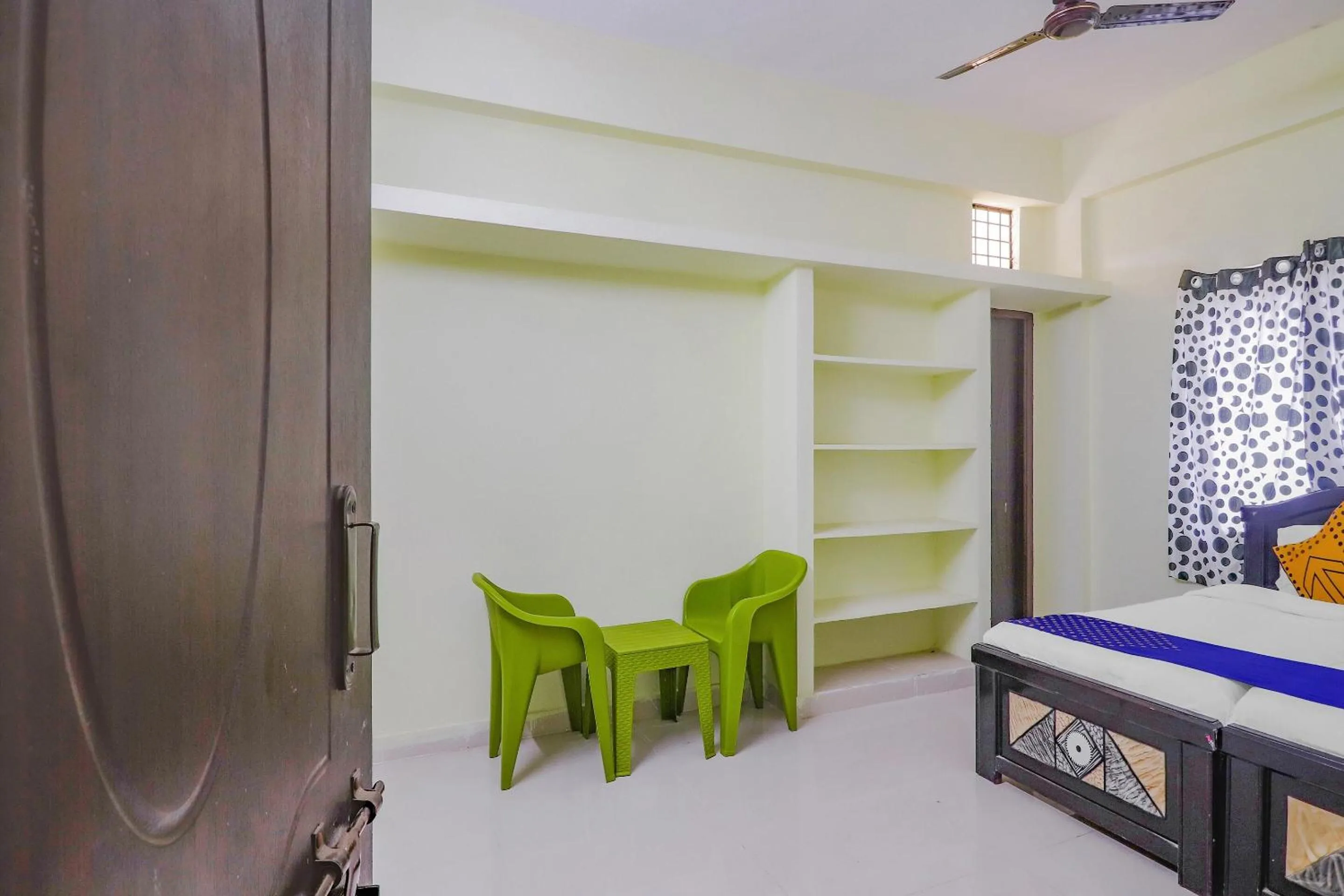 Bedroom in Hotel O Sri Residency