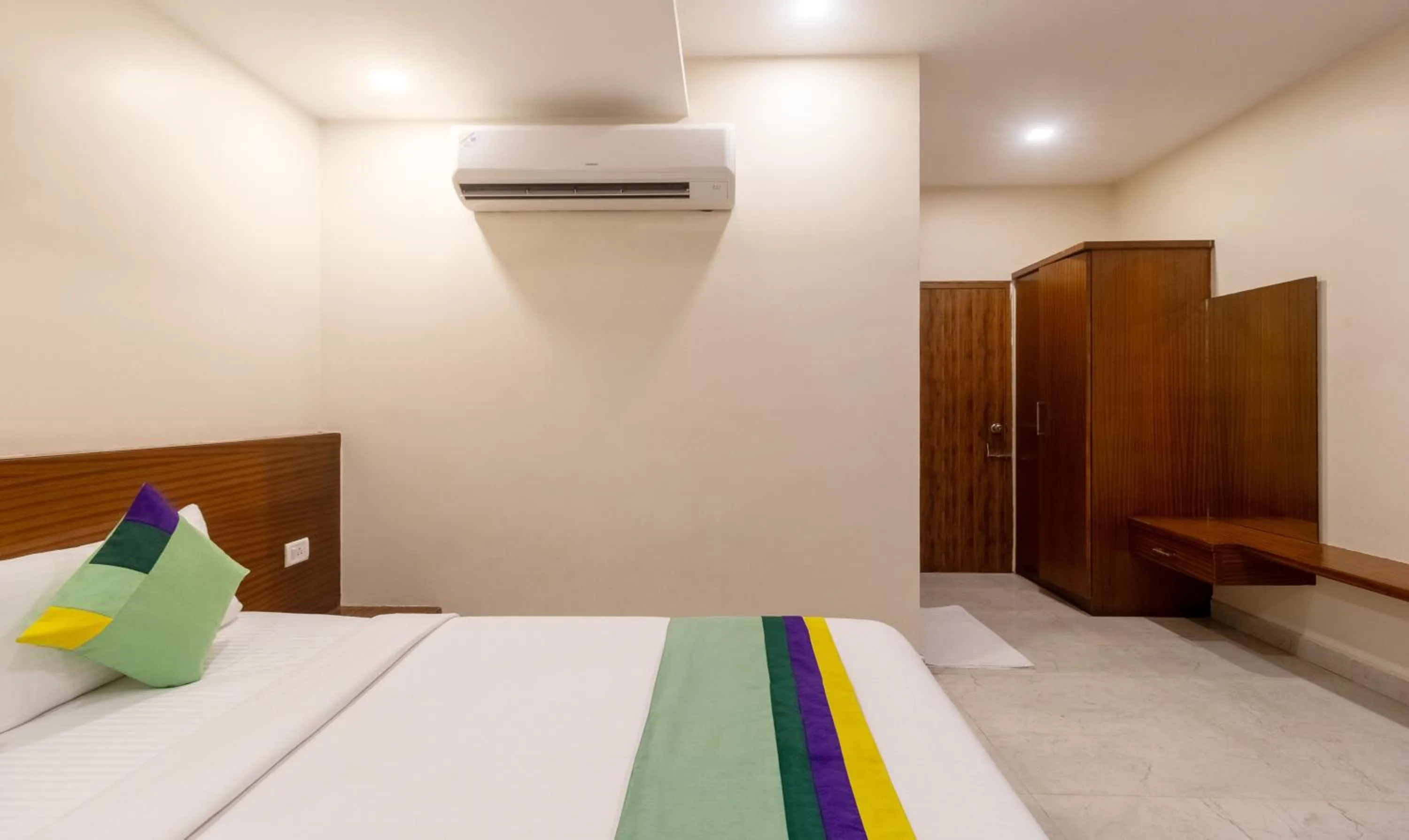 Bedroom, Bed in Treebo Anjani Fortune Suites