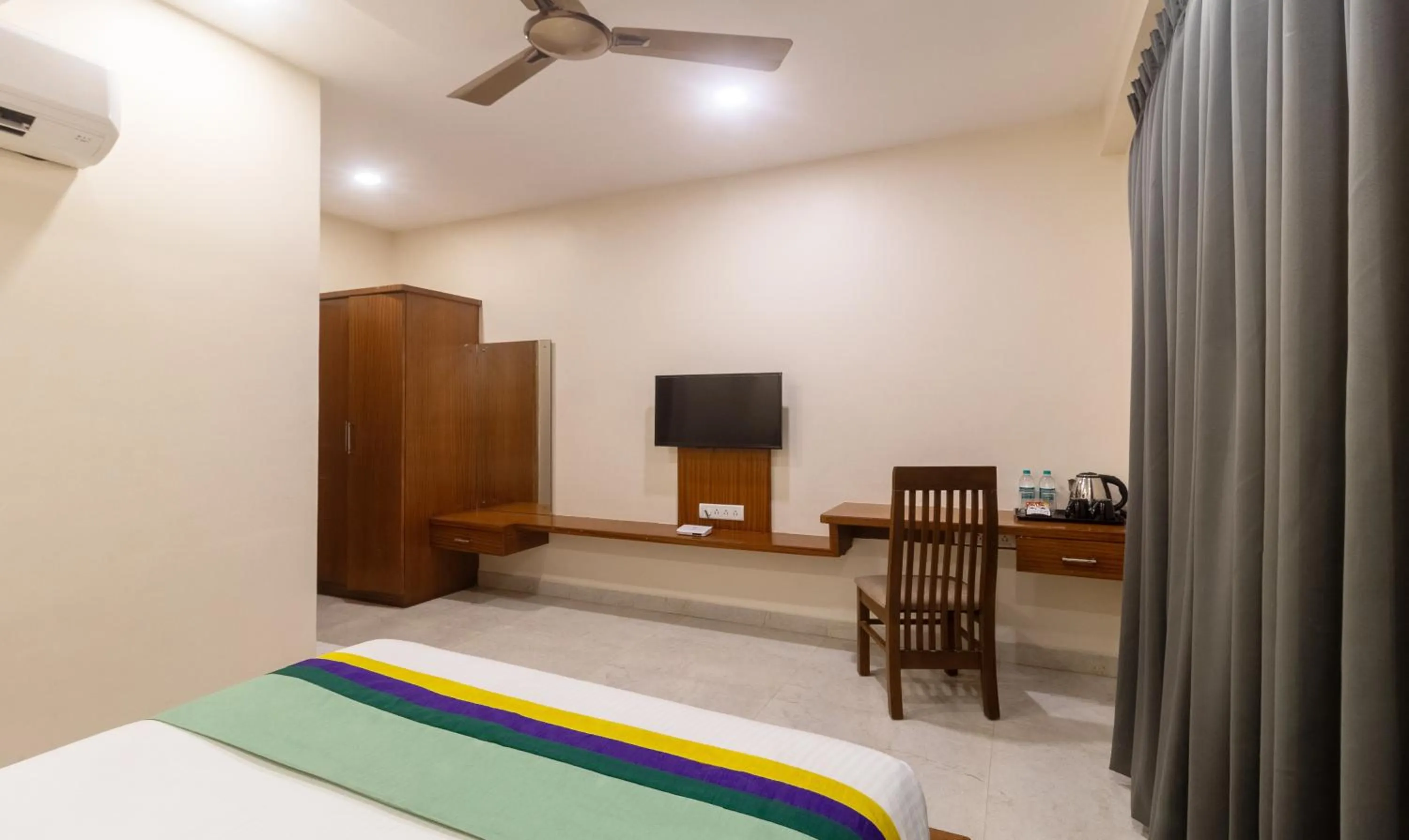 Bedroom, Bed in Treebo Anjani Fortune Suites