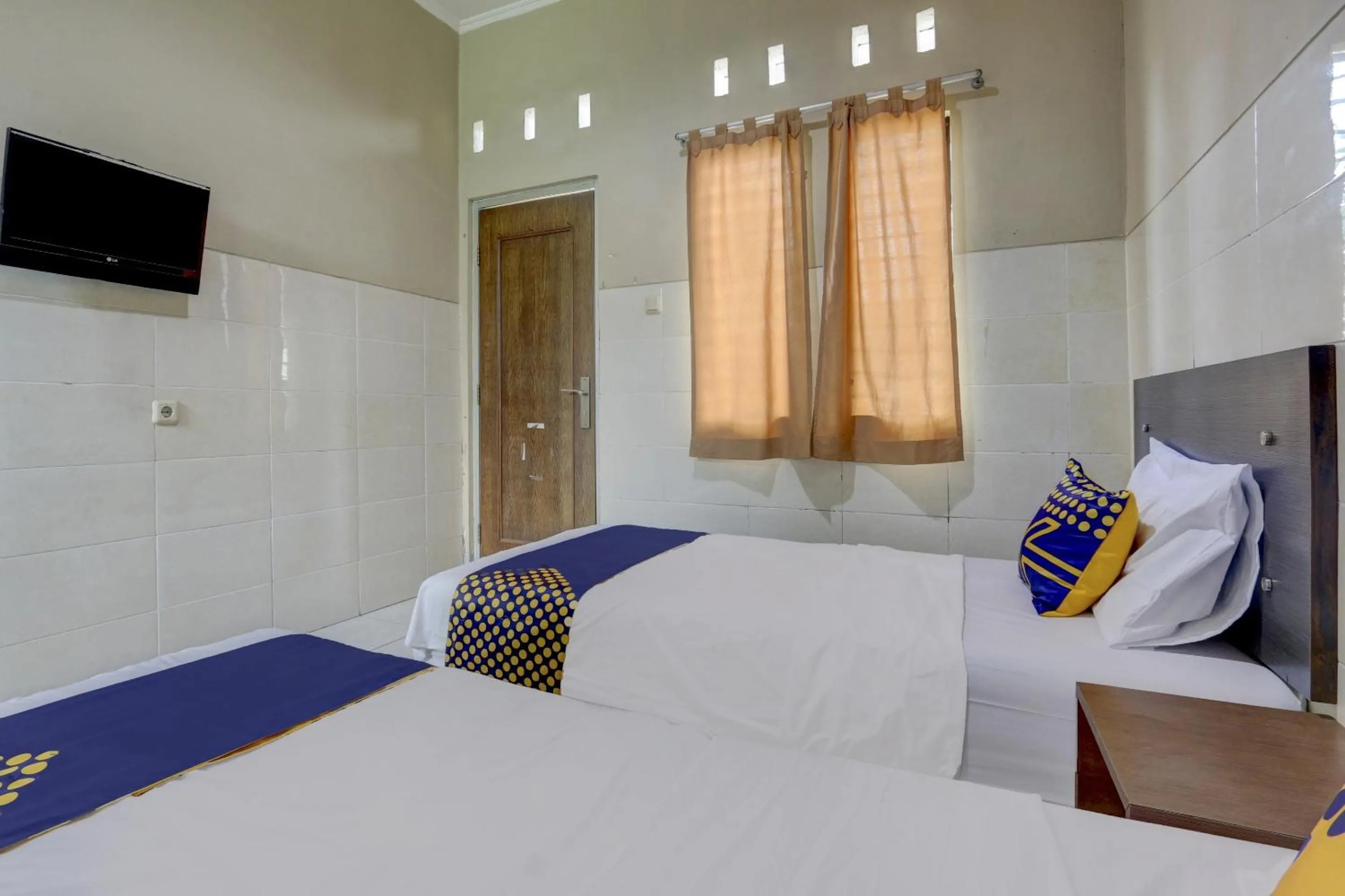 Bedroom, Bed in OYO Life 90159 Puri Asoka Guest House