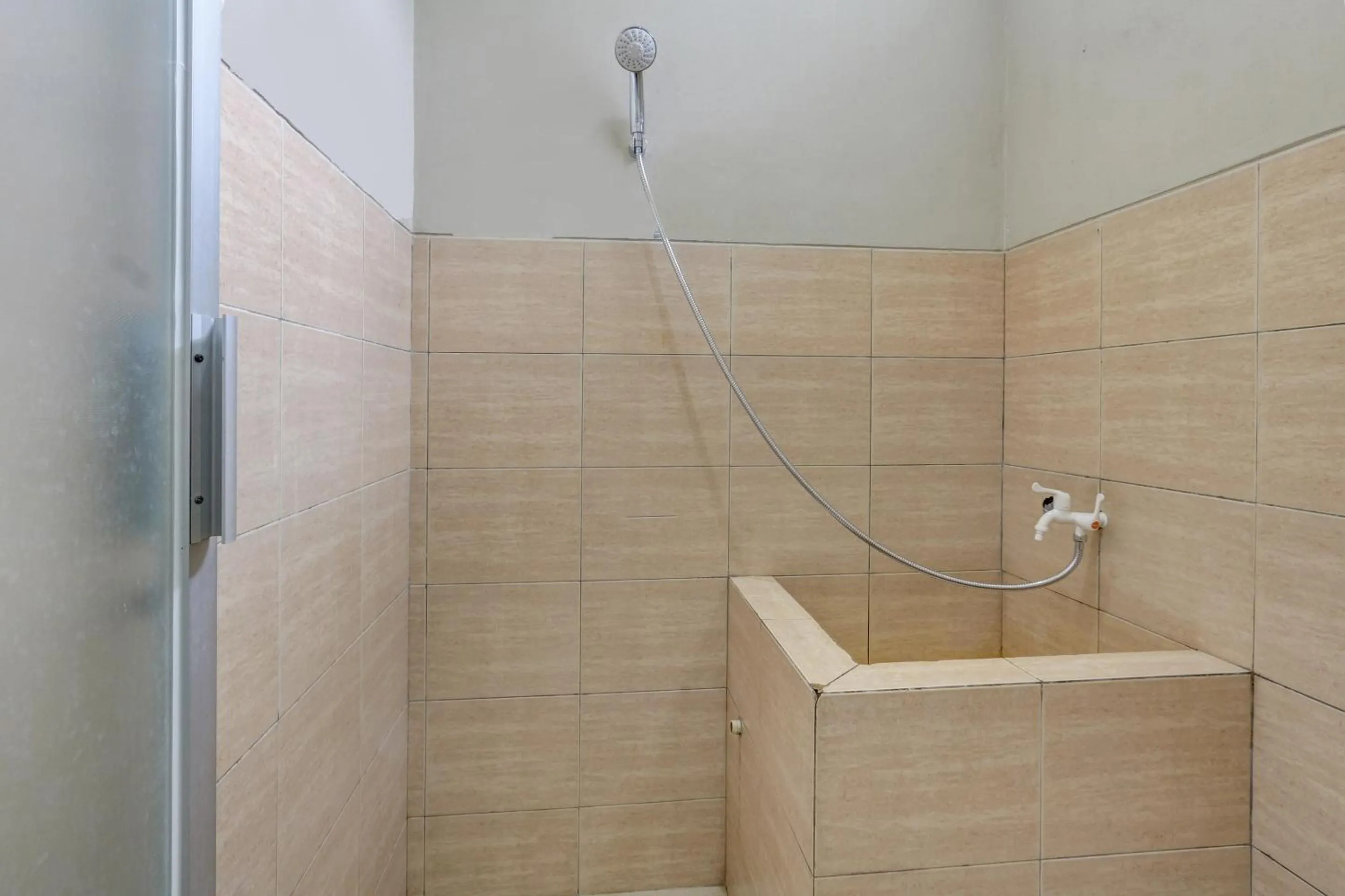 Bedroom in OYO Life 90159 Puri Asoka Guest House