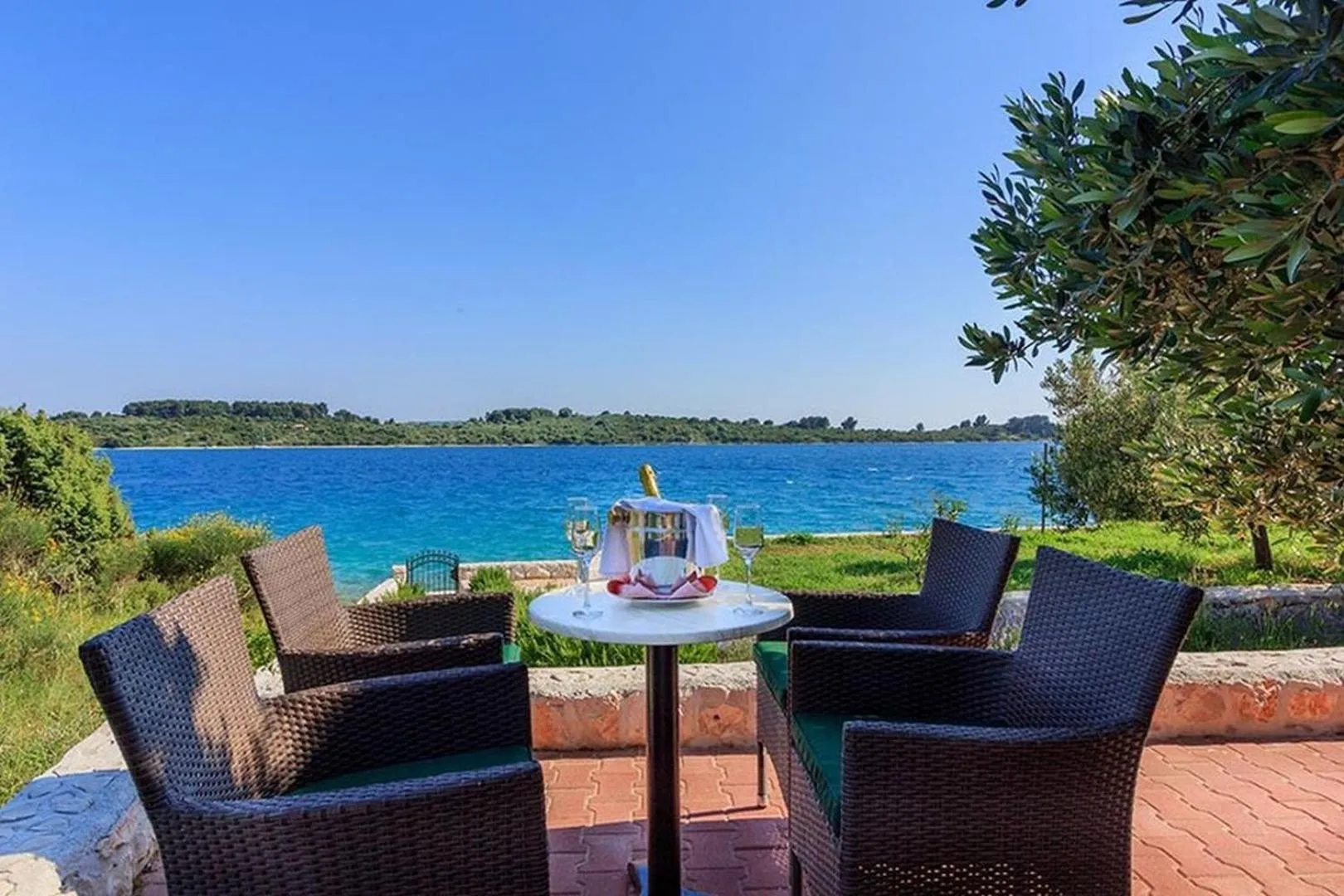 Property building in Luxury Beachfront Villa Dalmatino Trogir with private pool right at the beach in Okrug Gornji - Ciovo