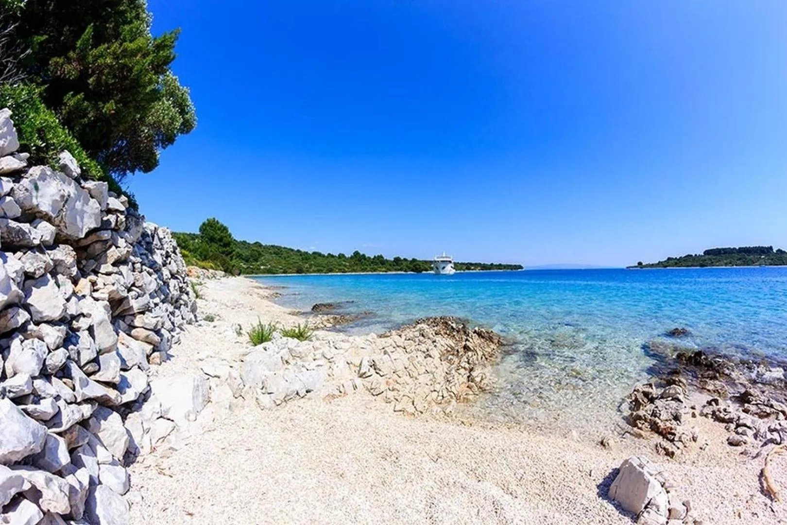 Property building in Luxury Beachfront Villa Dalmatino Trogir with private pool right at the beach in Okrug Gornji - Ciovo