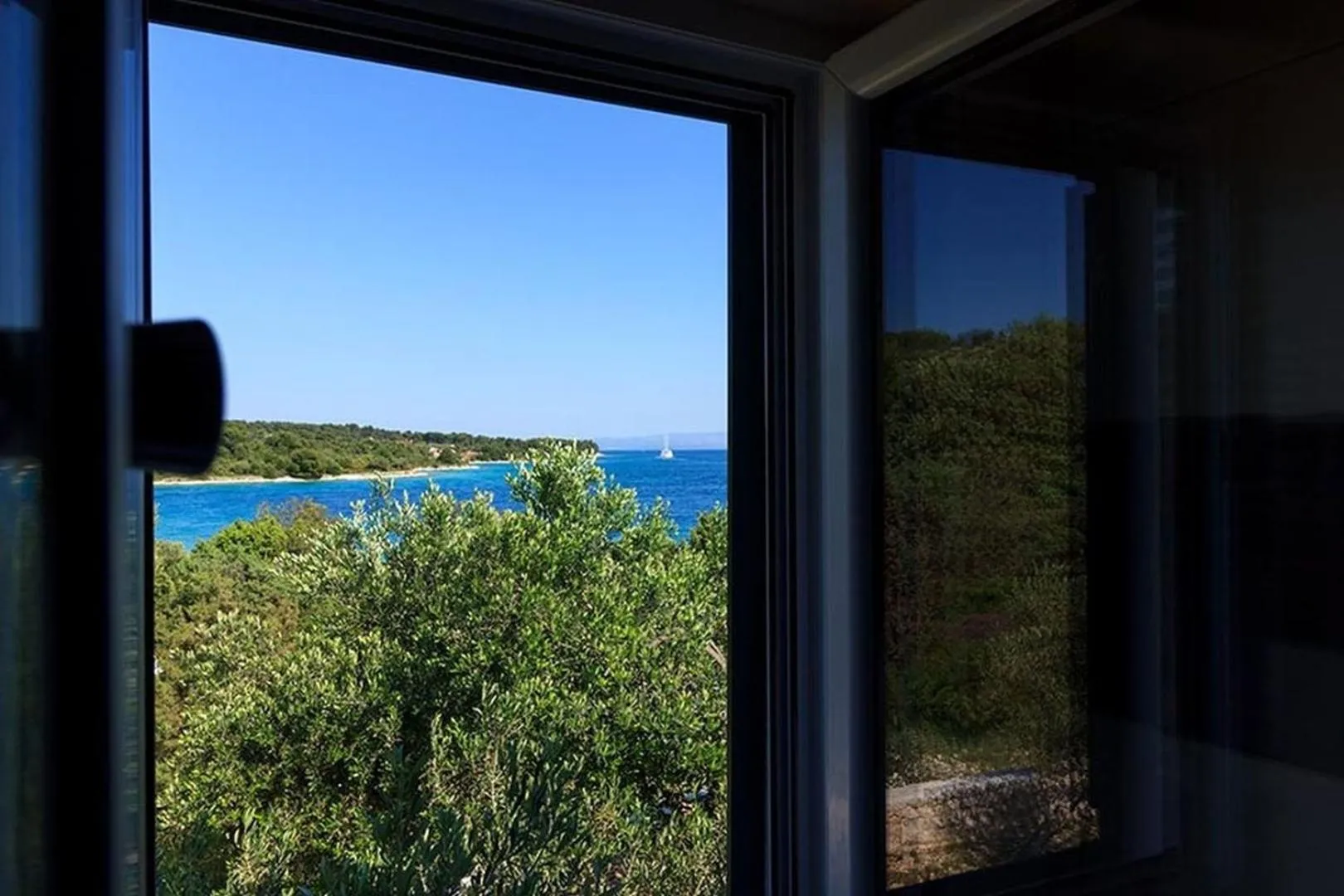 Property building in Luxury Beachfront Villa Dalmatino Trogir with private pool right at the beach in Okrug Gornji - Ciovo