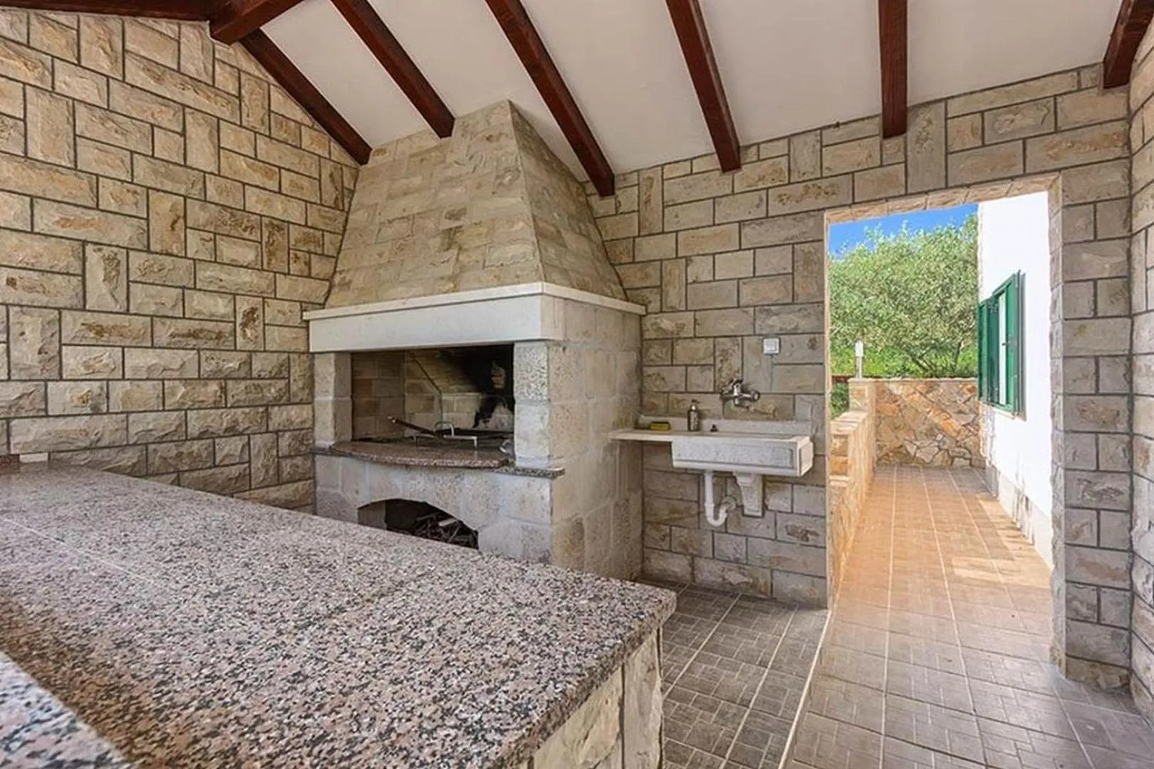 Property building in Luxury Beachfront Villa Dalmatino Trogir with private pool right at the beach in Okrug Gornji - Ciovo