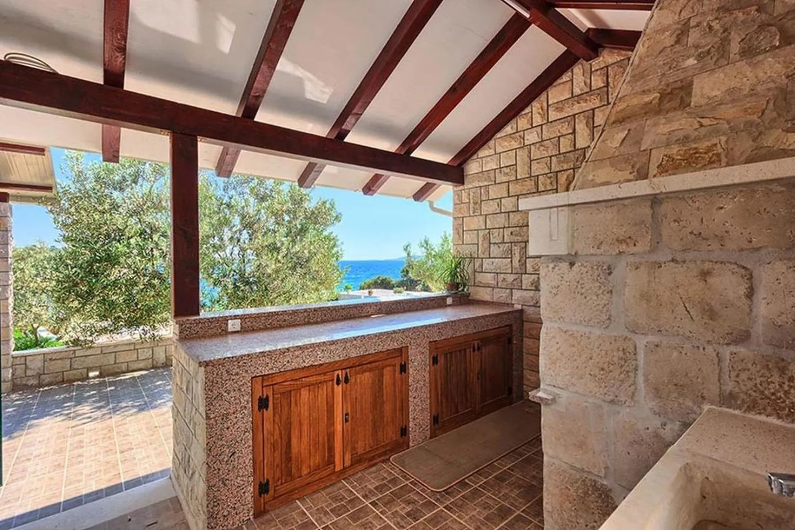 Property building in Luxury Beachfront Villa Dalmatino Trogir with private pool right at the beach in Okrug Gornji - Ciovo