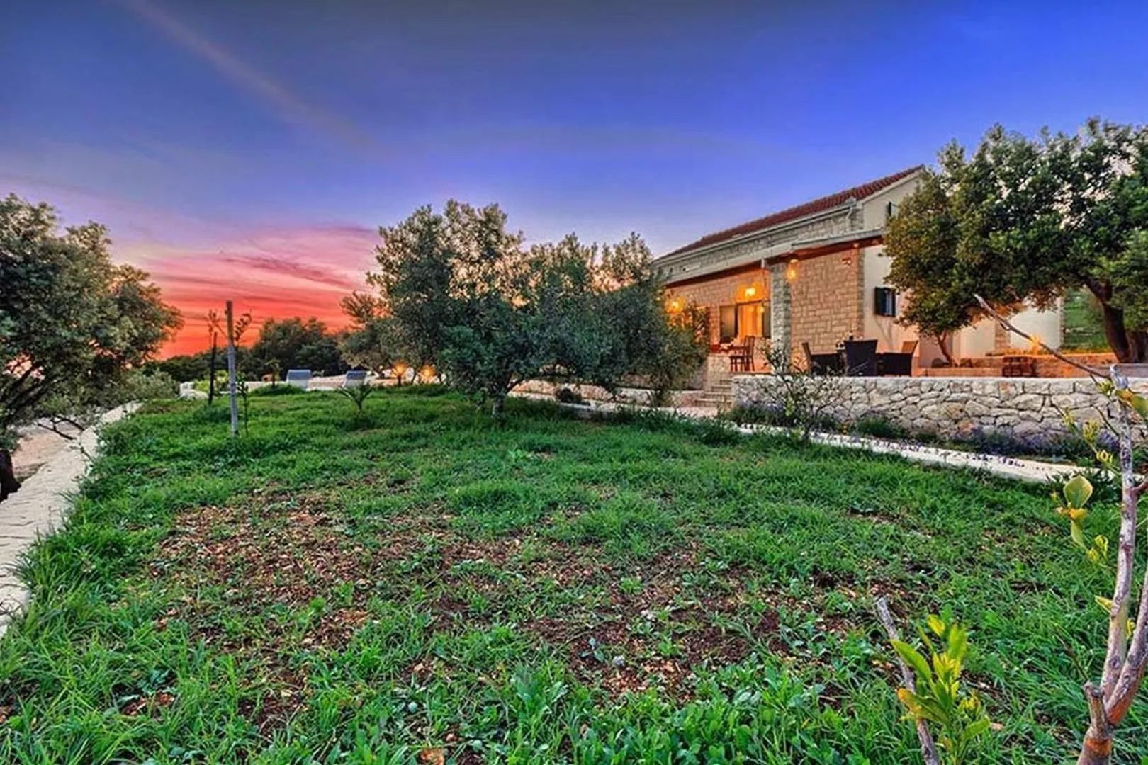 Property building in Luxury Beachfront Villa Dalmatino Trogir with private pool right at the beach in Okrug Gornji - Ciovo