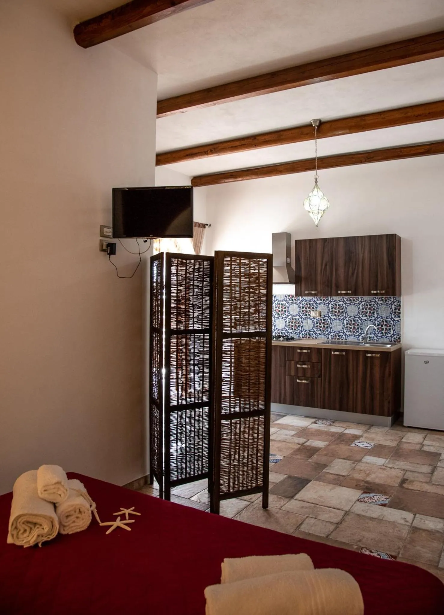 Communal lounge/ TV room, Bed in CASE VACANZE I QUATTROVENTI