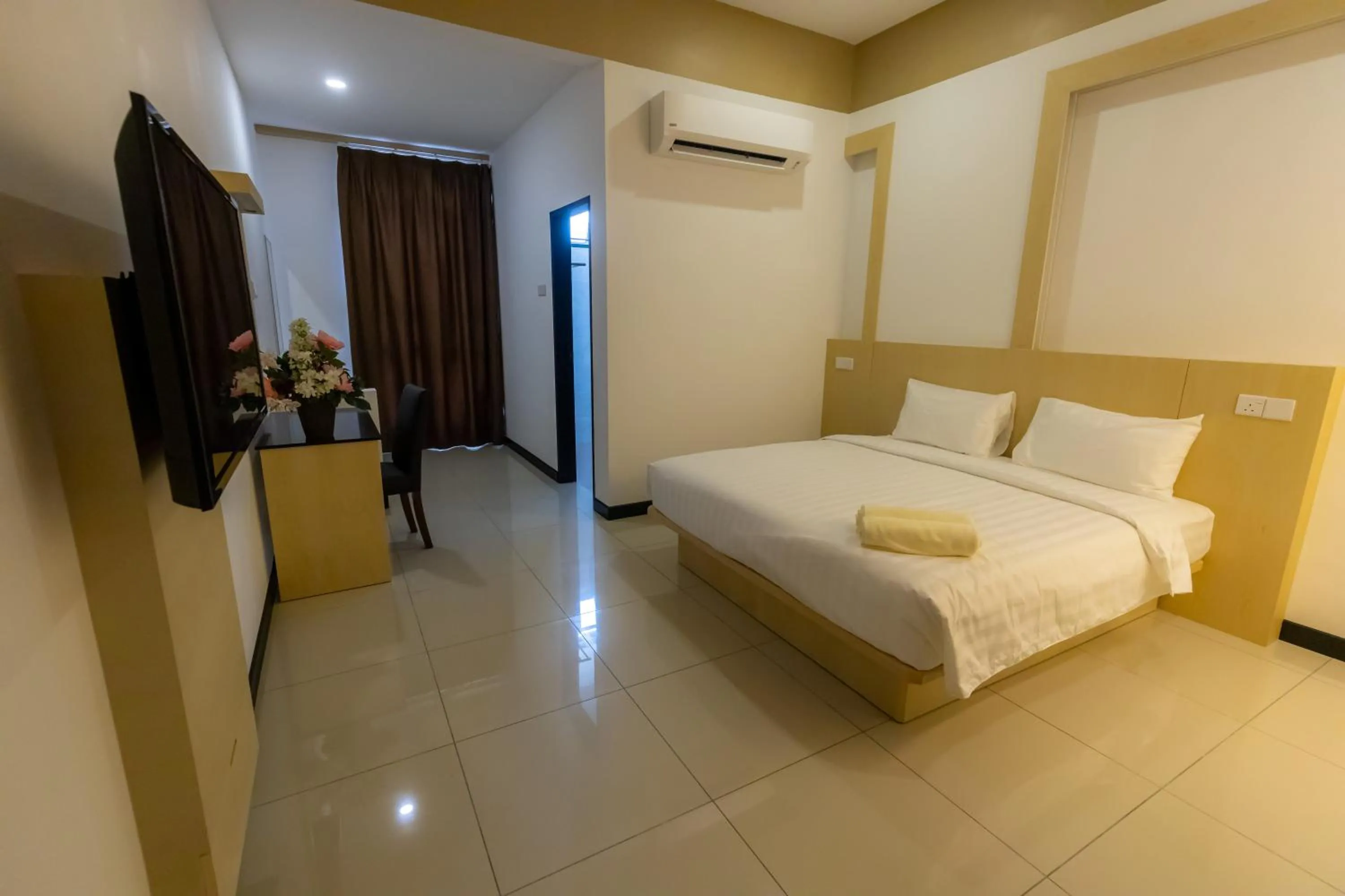 Bed in Scott Service Suites