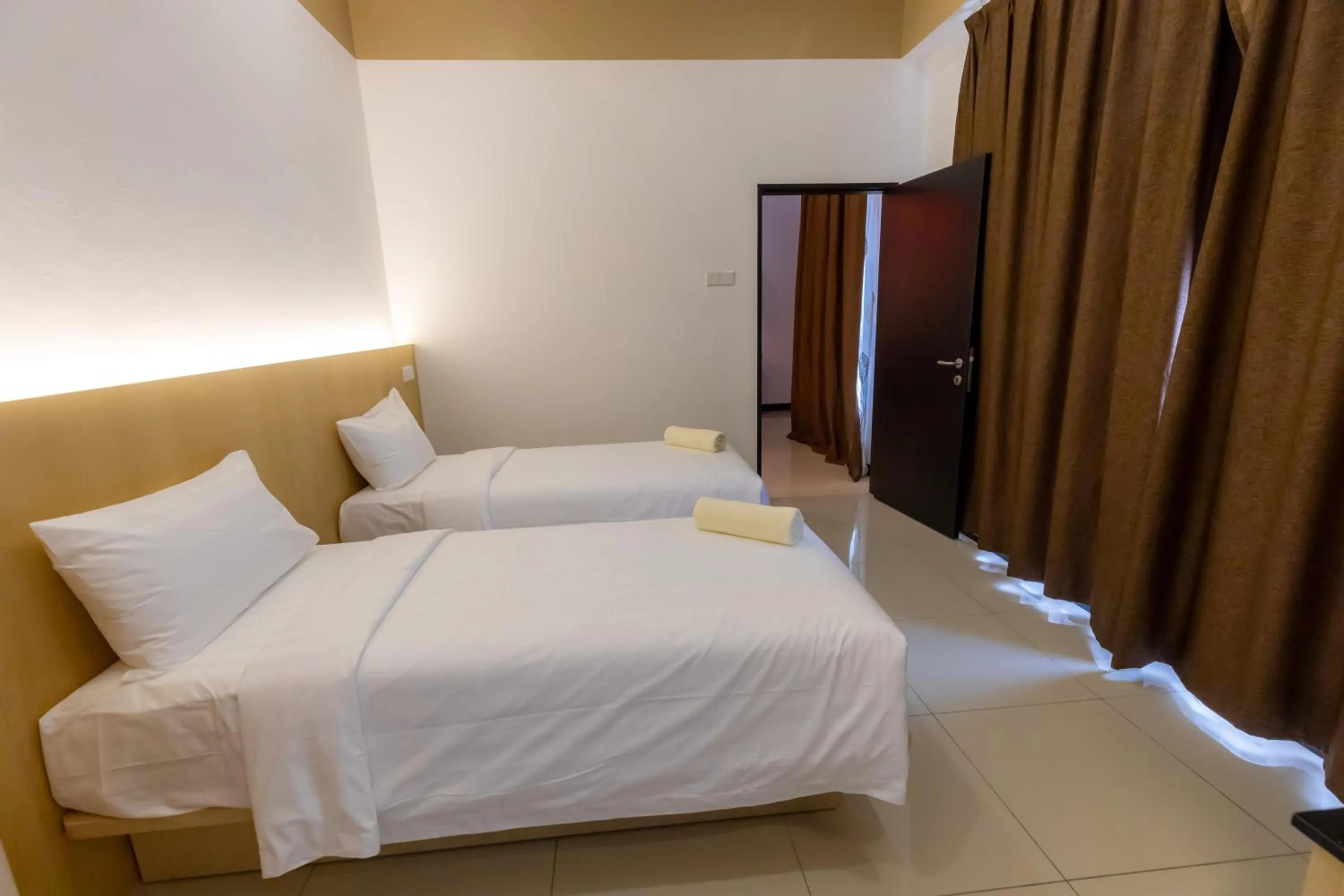 Bed in Scott Service Suites