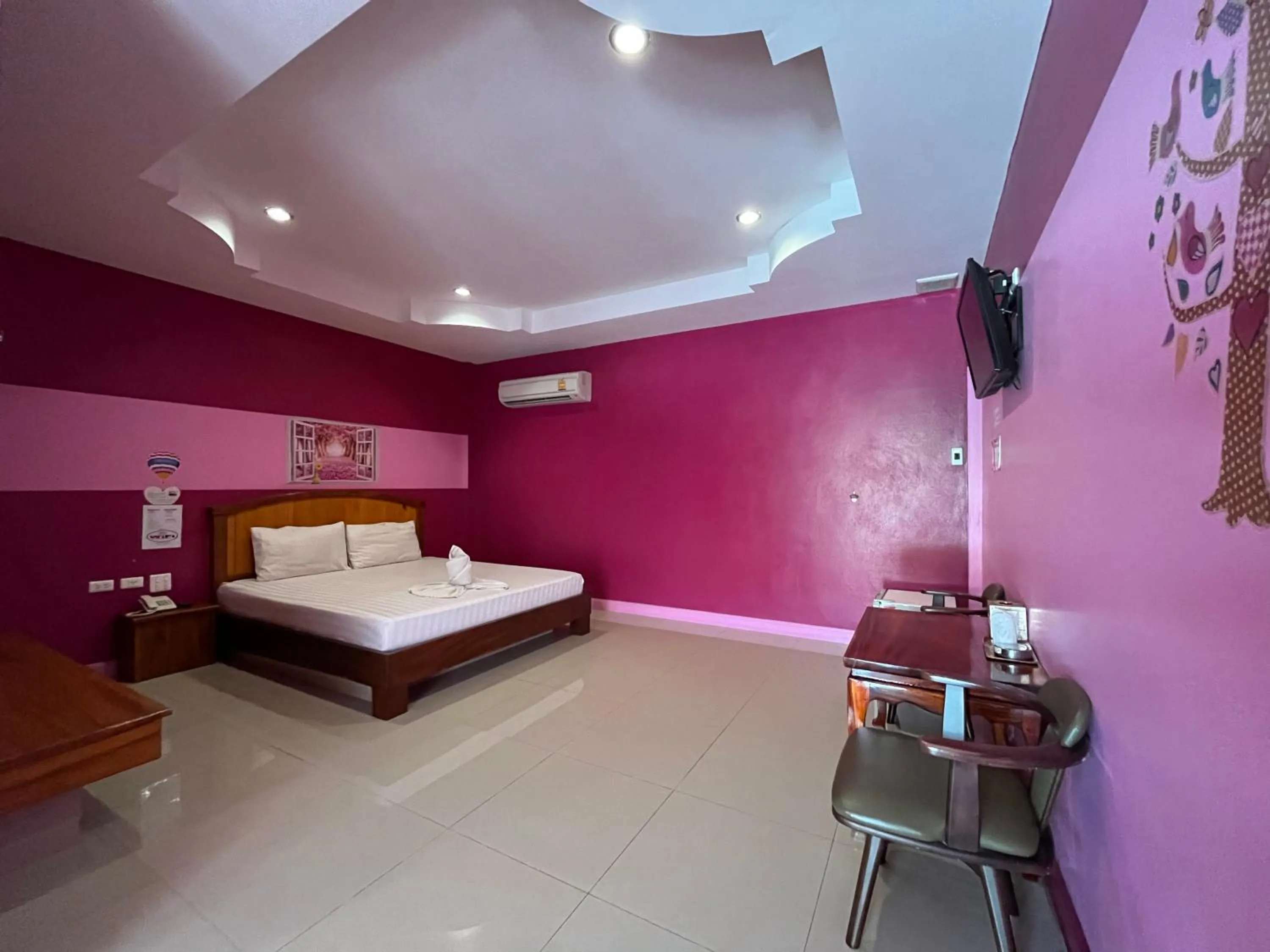 Bed in The Palm Resort Kampeang Saen