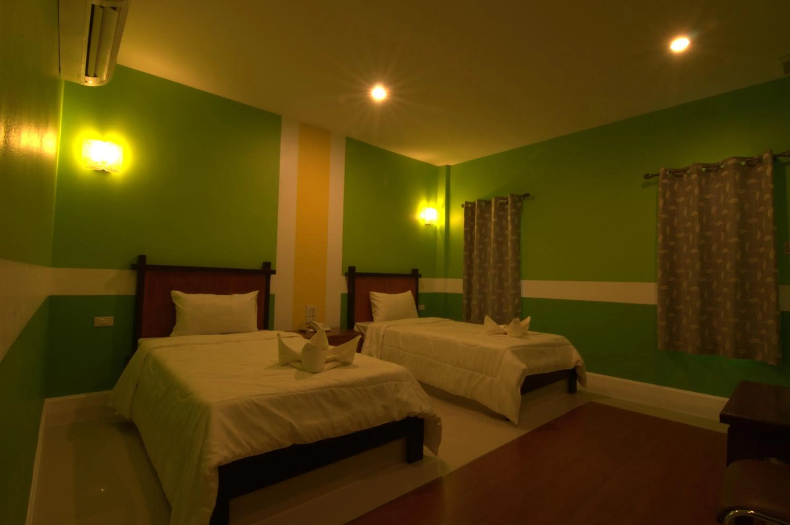 Bed in The Palm Resort Kampeang Saen