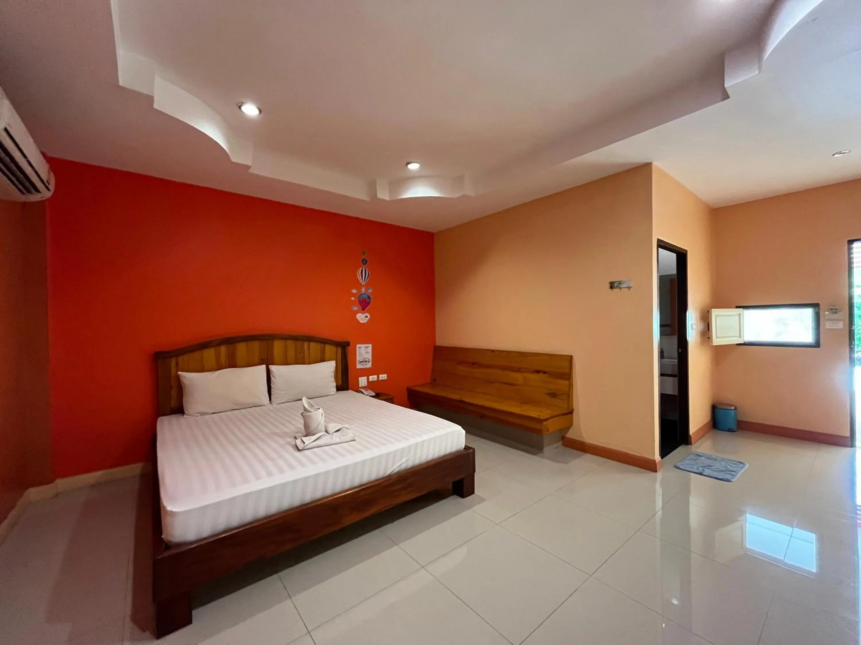 Bed in The Palm Resort Kampeang Saen