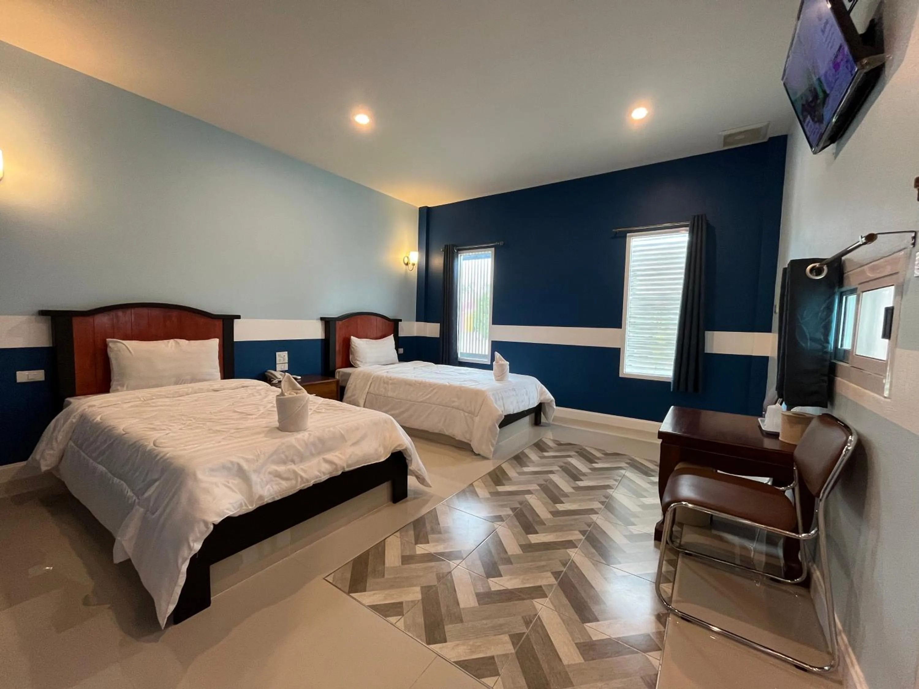 Bed in The Palm Resort Kampeang Saen