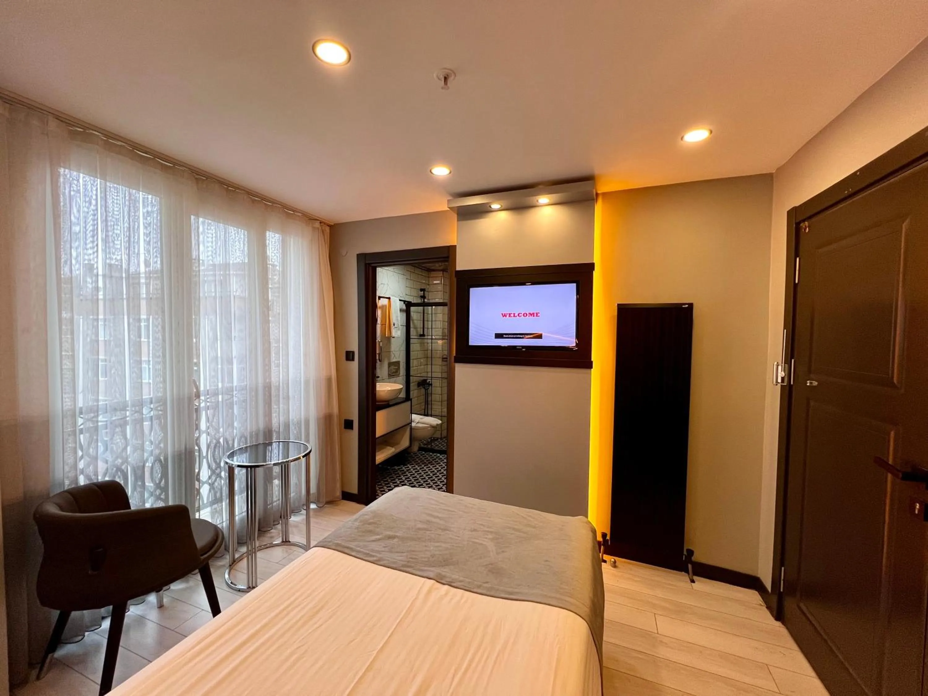 Bed in White Corner Hotel