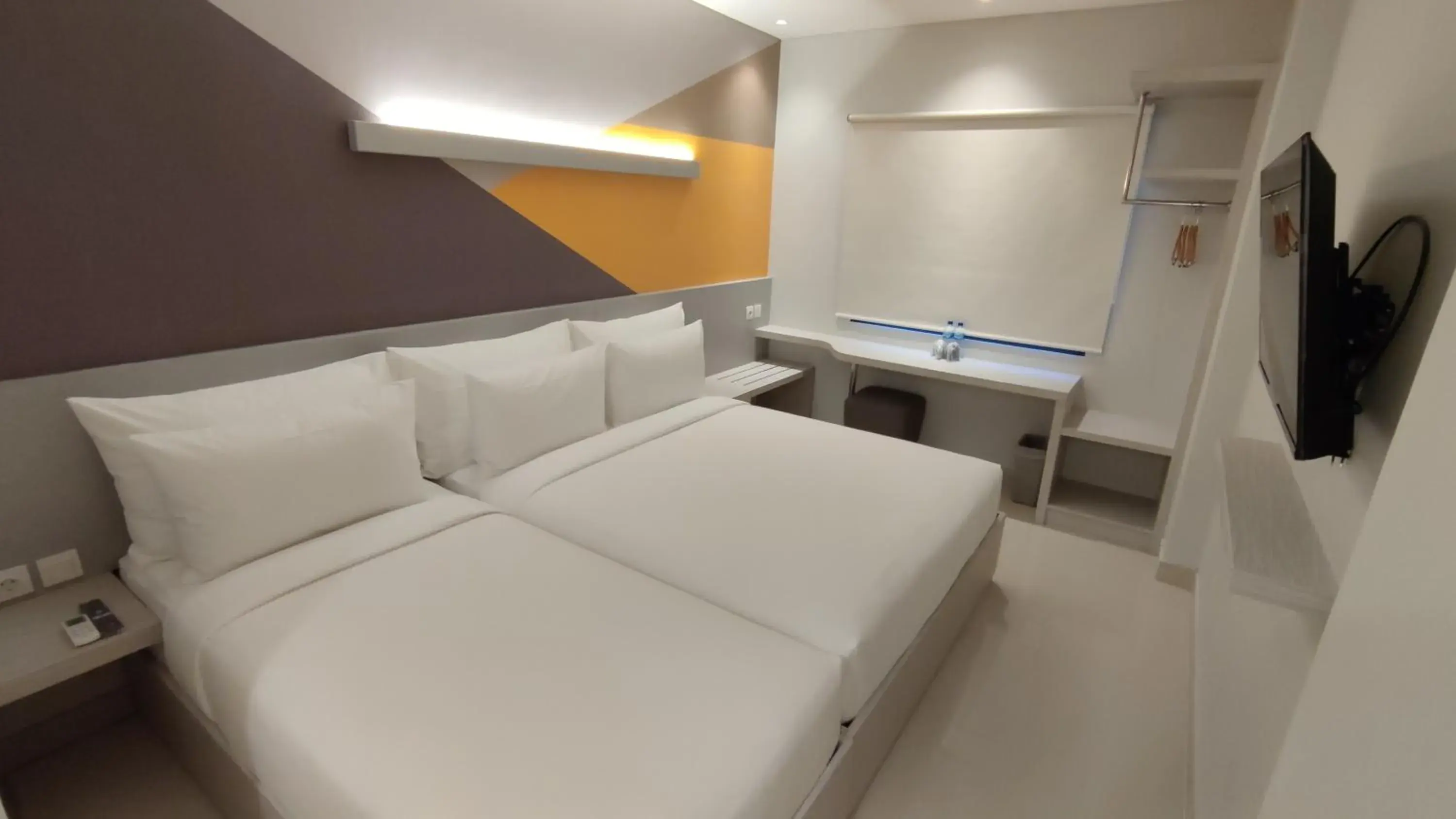 Triple Room in Agogo Downtown Hotel Surabaya Triple Room in Agogo Downtown Hotel Surabaya