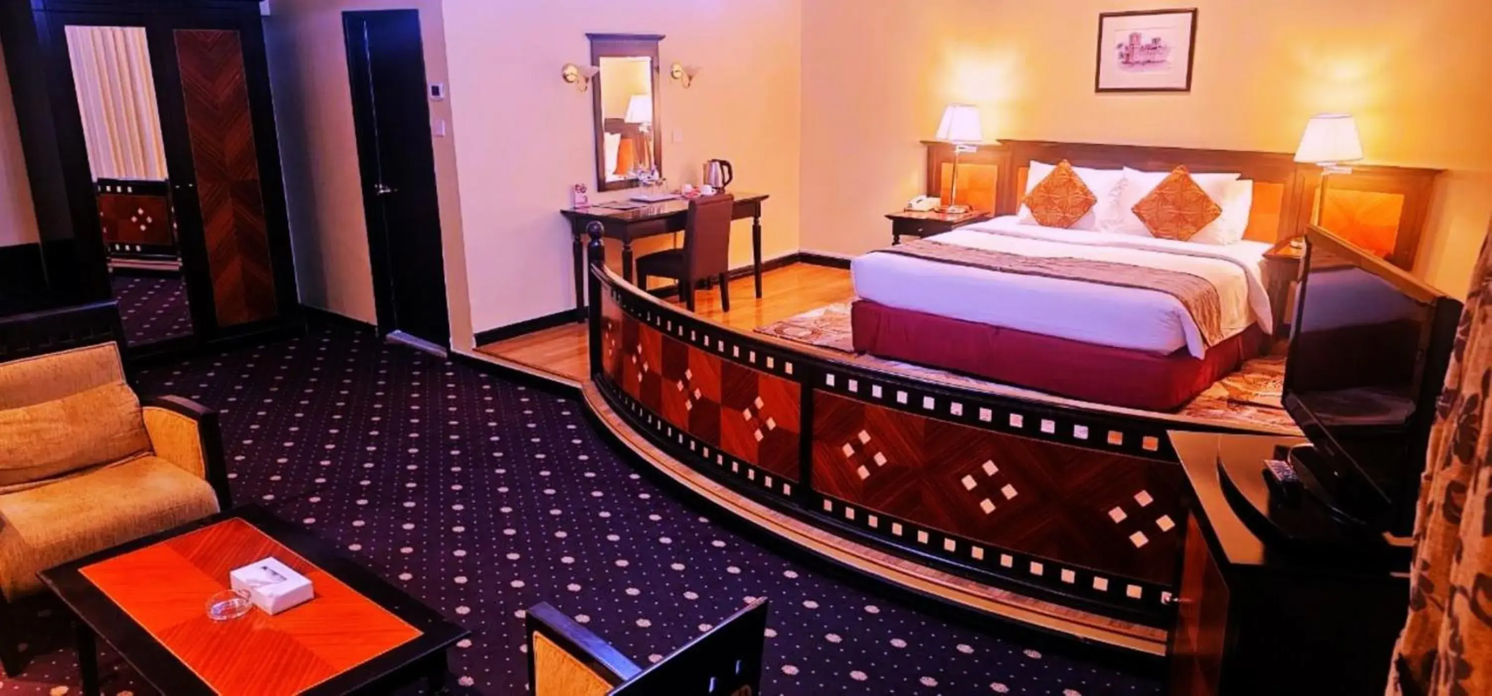 Seating area, Bed in Rolla Suites Hotel -Former J5 Bur Dubai Hotel Seating area, Bed in Rolla Suites Hotel -Former J5 Bur Dubai Hotel