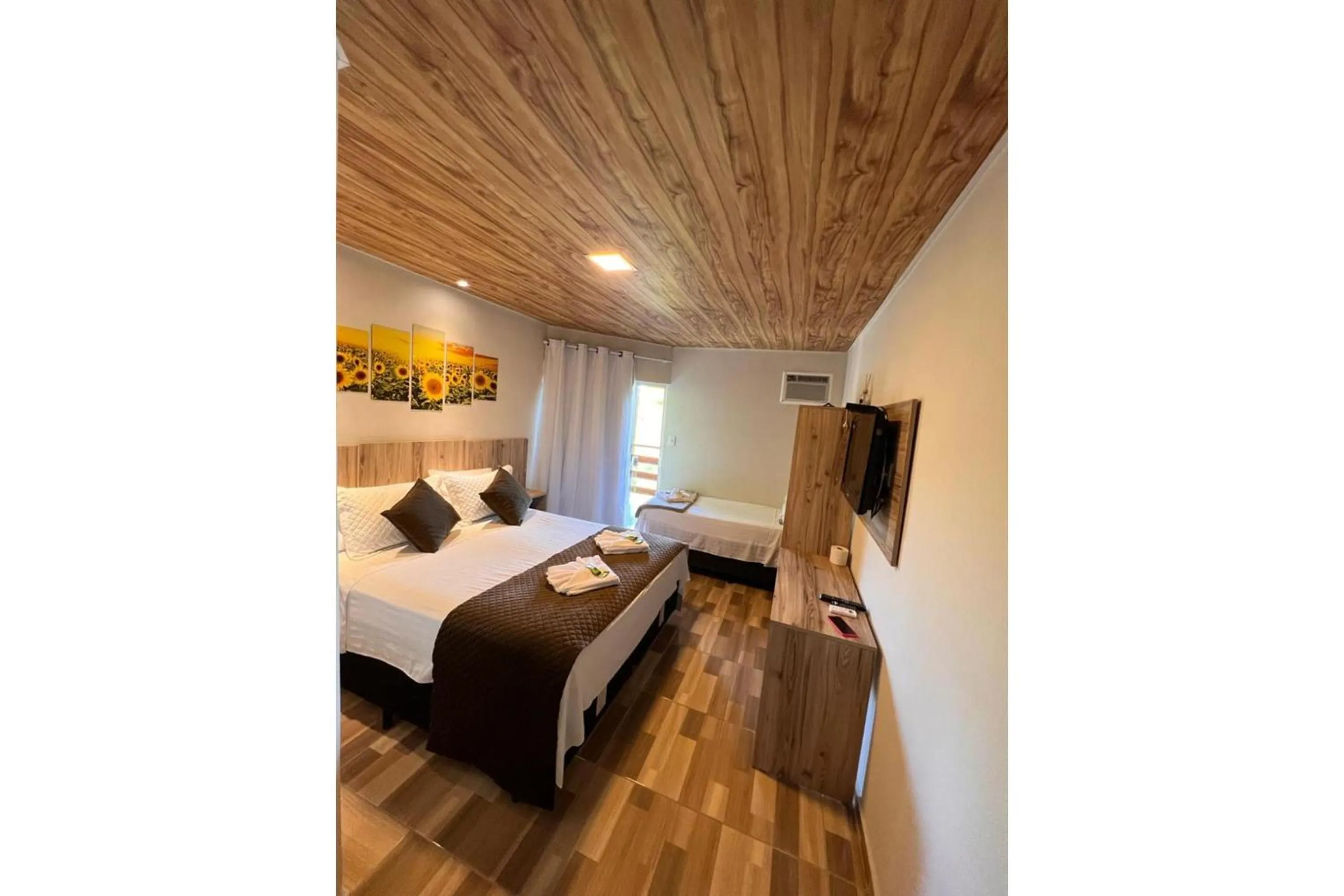 Bedroom in OYO Pousada Coisa Mais Linda