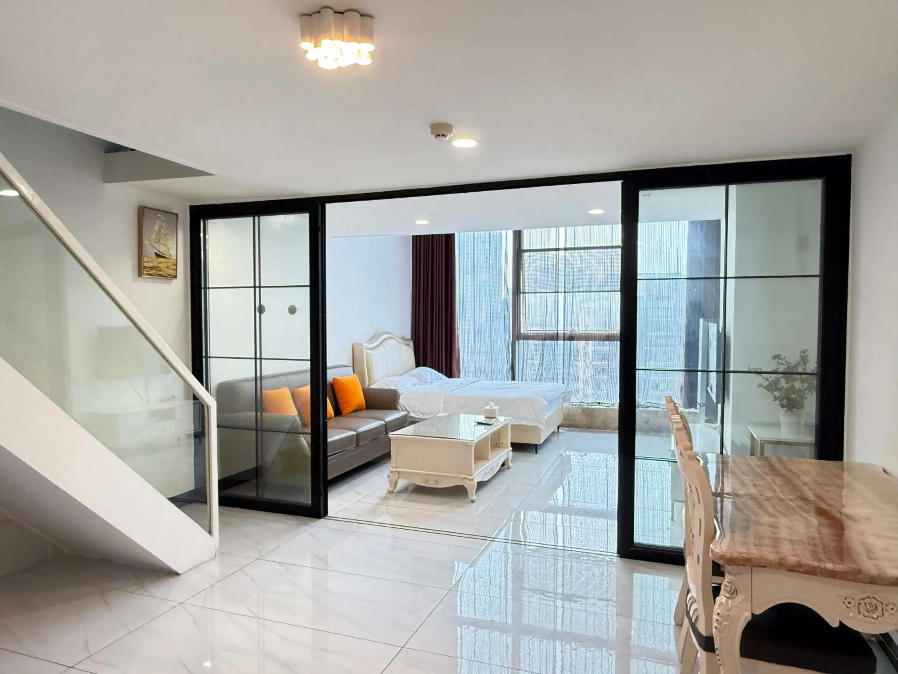 Living room in Barton International Residence Guangzhou - located in the city center adjacent to Beijing Road Pedestrian Street and Dafo Temple and close to the subway