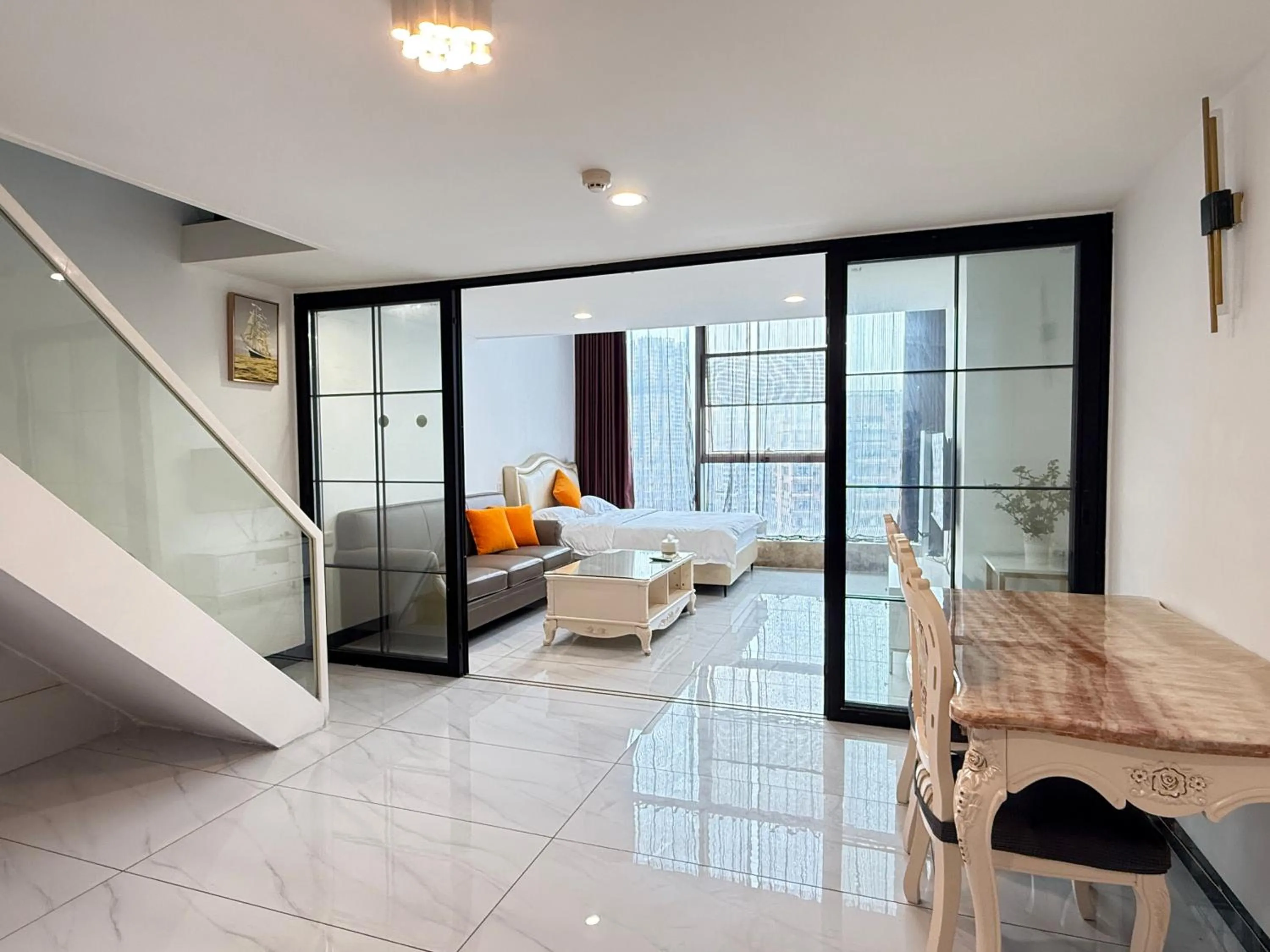 Living room in Barton International Residence Guangzhou - located in the city center adjacent to Beijing Road Pedestrian Street and Dafo Temple and close to the subway