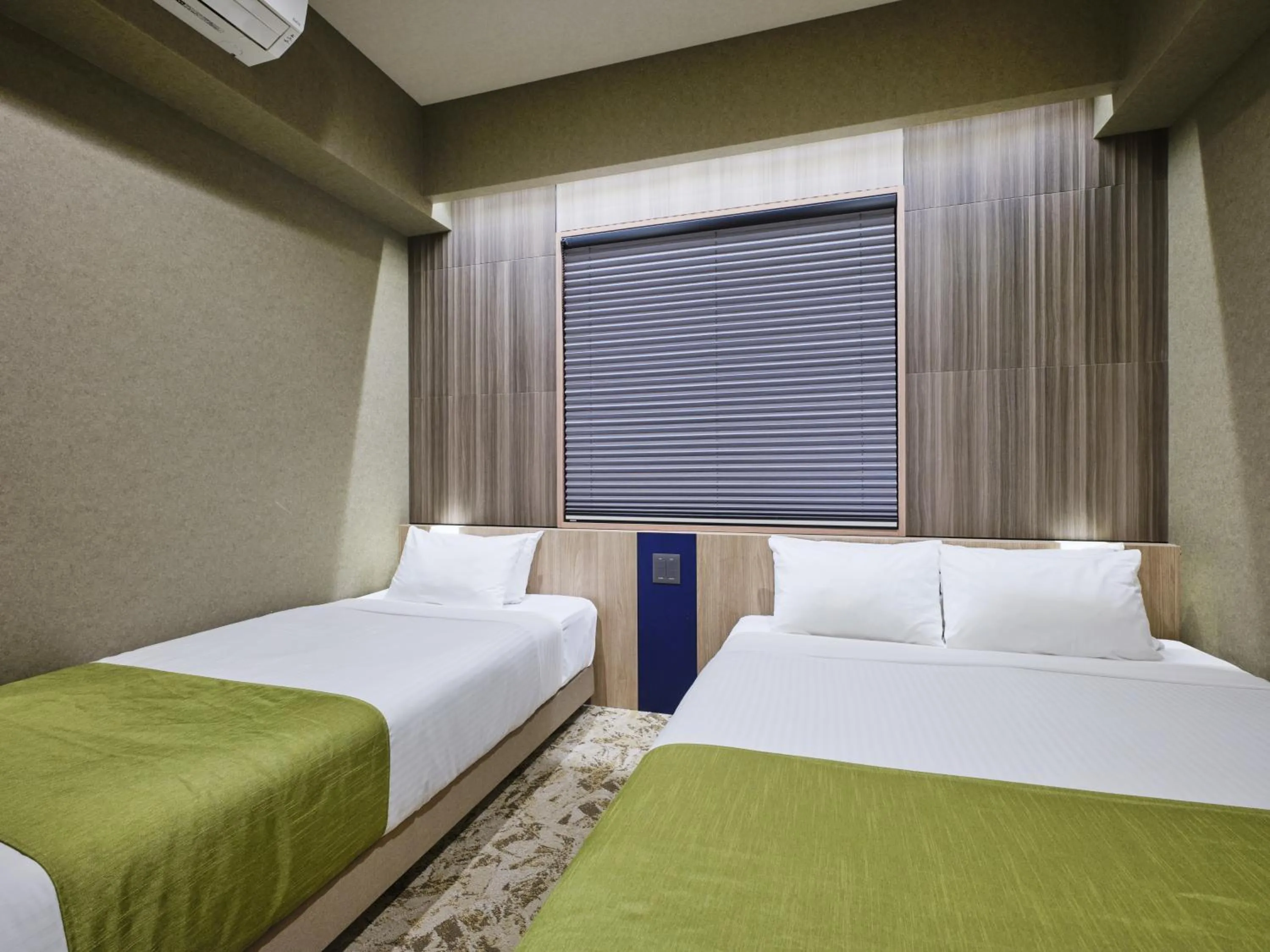 Bed in MONday Apart Premium UENO