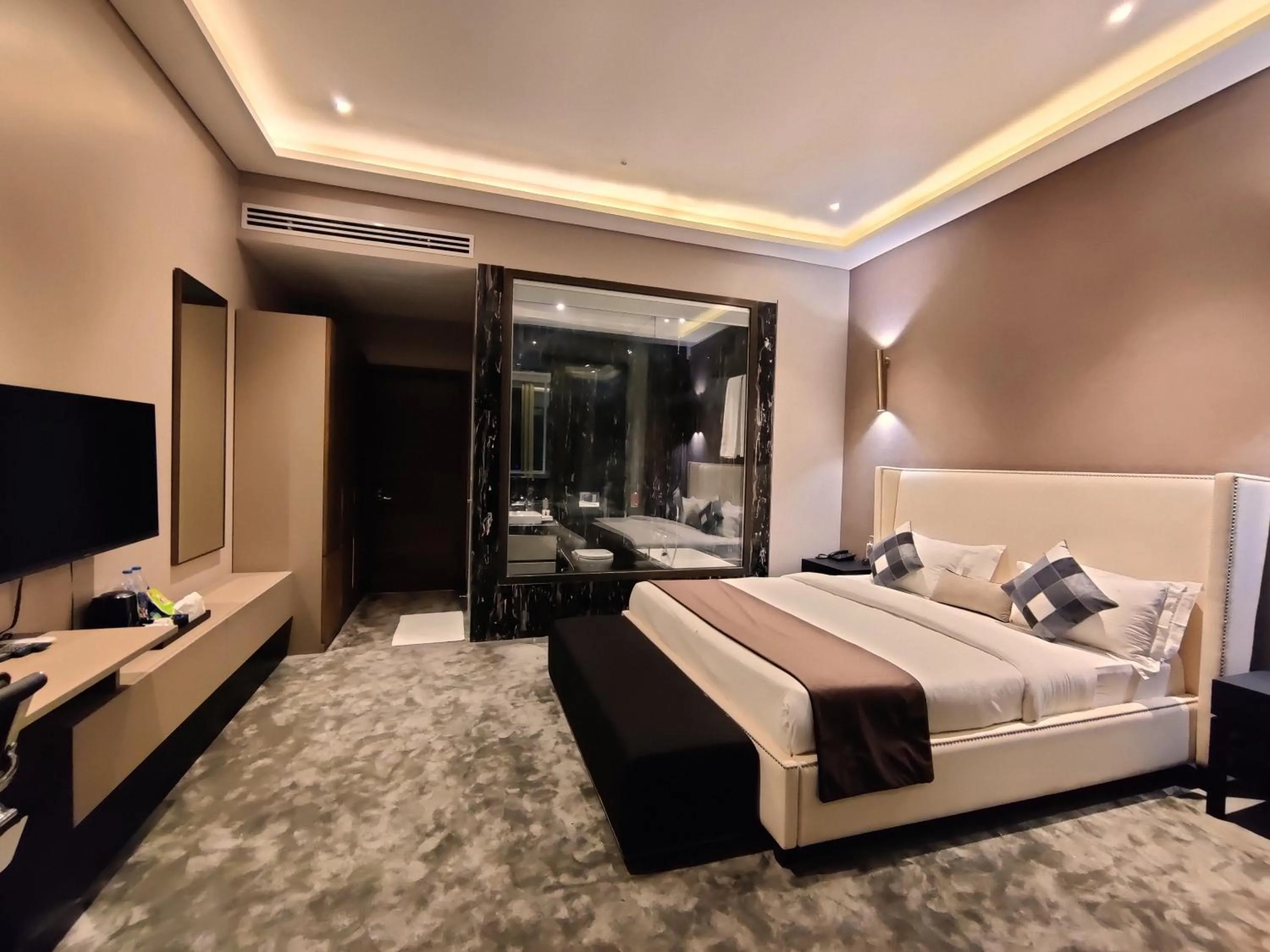 Bed in Leela Resort, The Exotic Boutique Hotel - Pure Veg