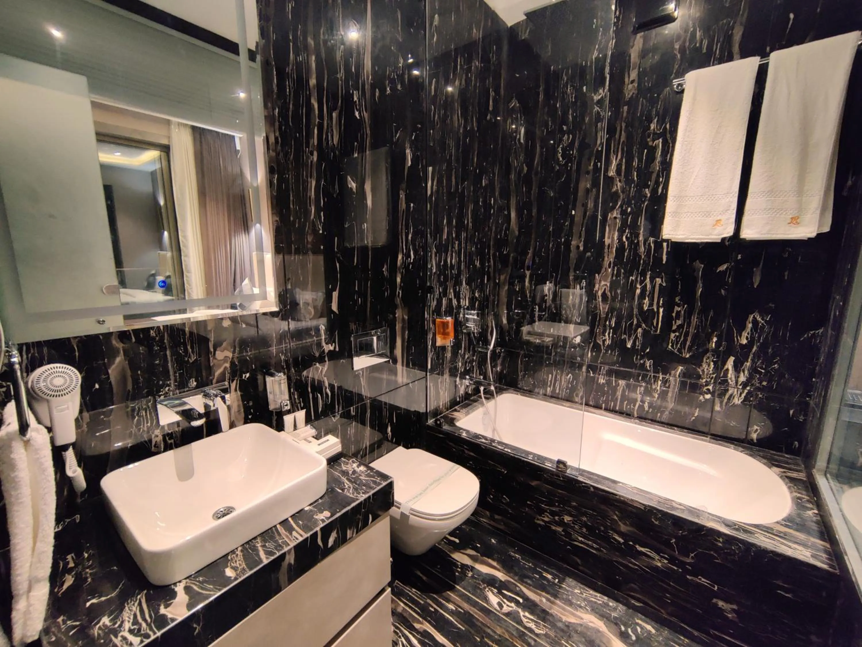 Bathroom in Leela Resort, The Exotic Boutique Hotel - Pure Veg