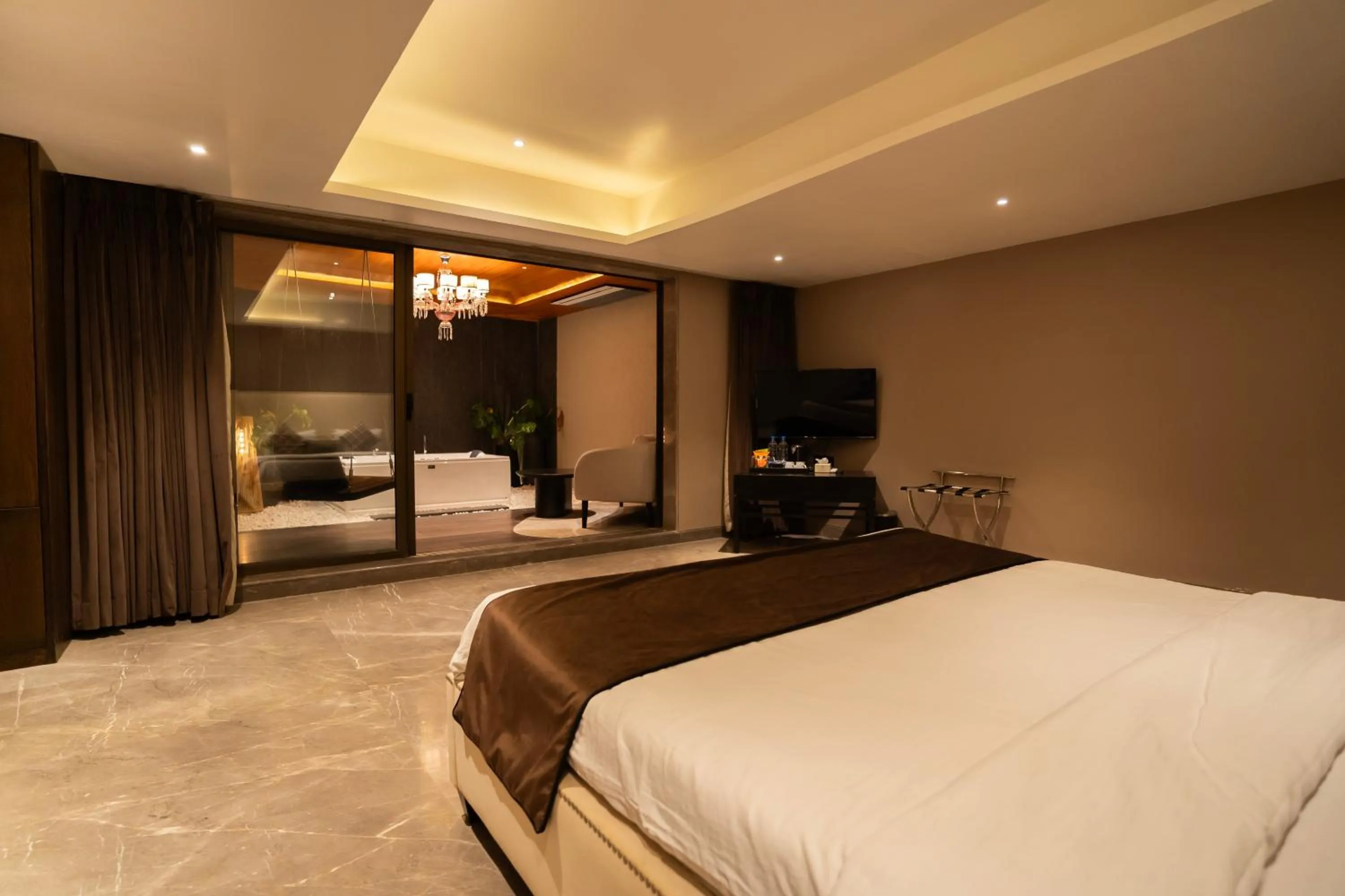 Bed in Leela Resort, The Exotic Boutique Hotel - Pure Veg