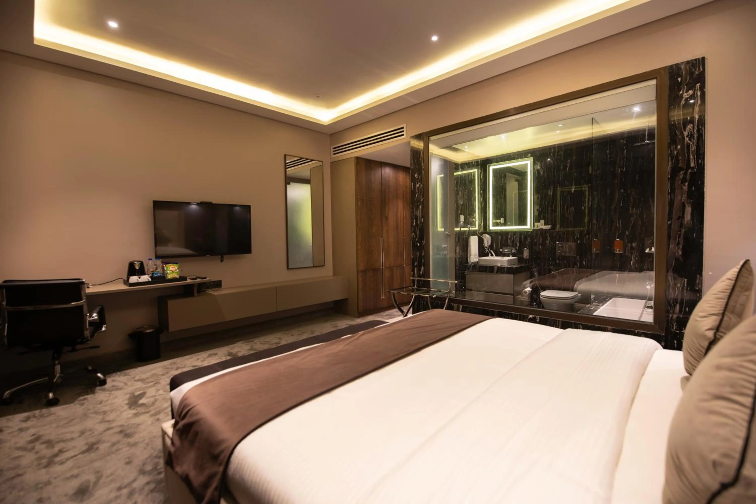 Bed in Leela Resort, The Exotic Boutique Hotel - Pure Veg