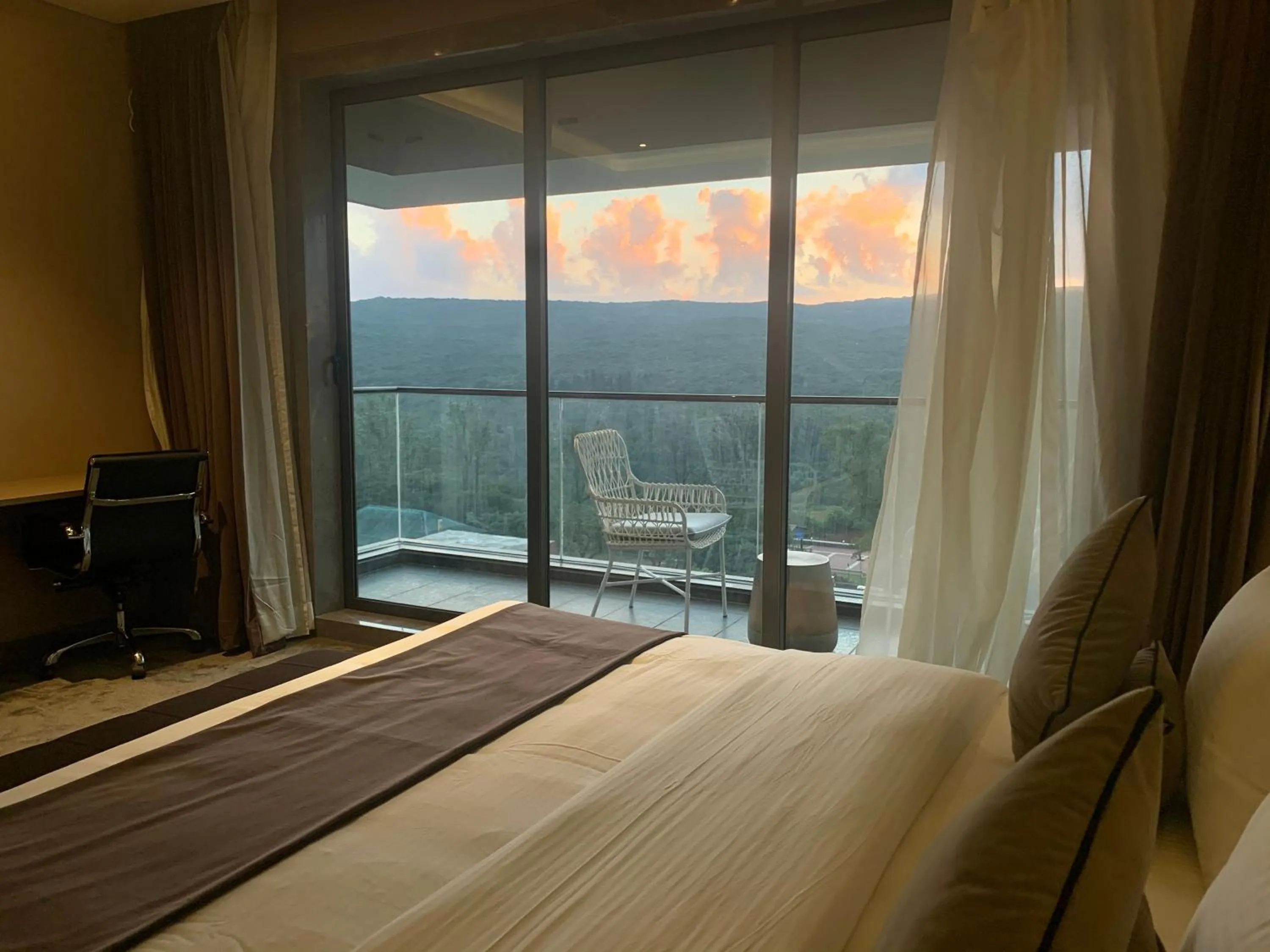 Bed in Leela Resort, The Exotic Boutique Hotel - Pure Veg