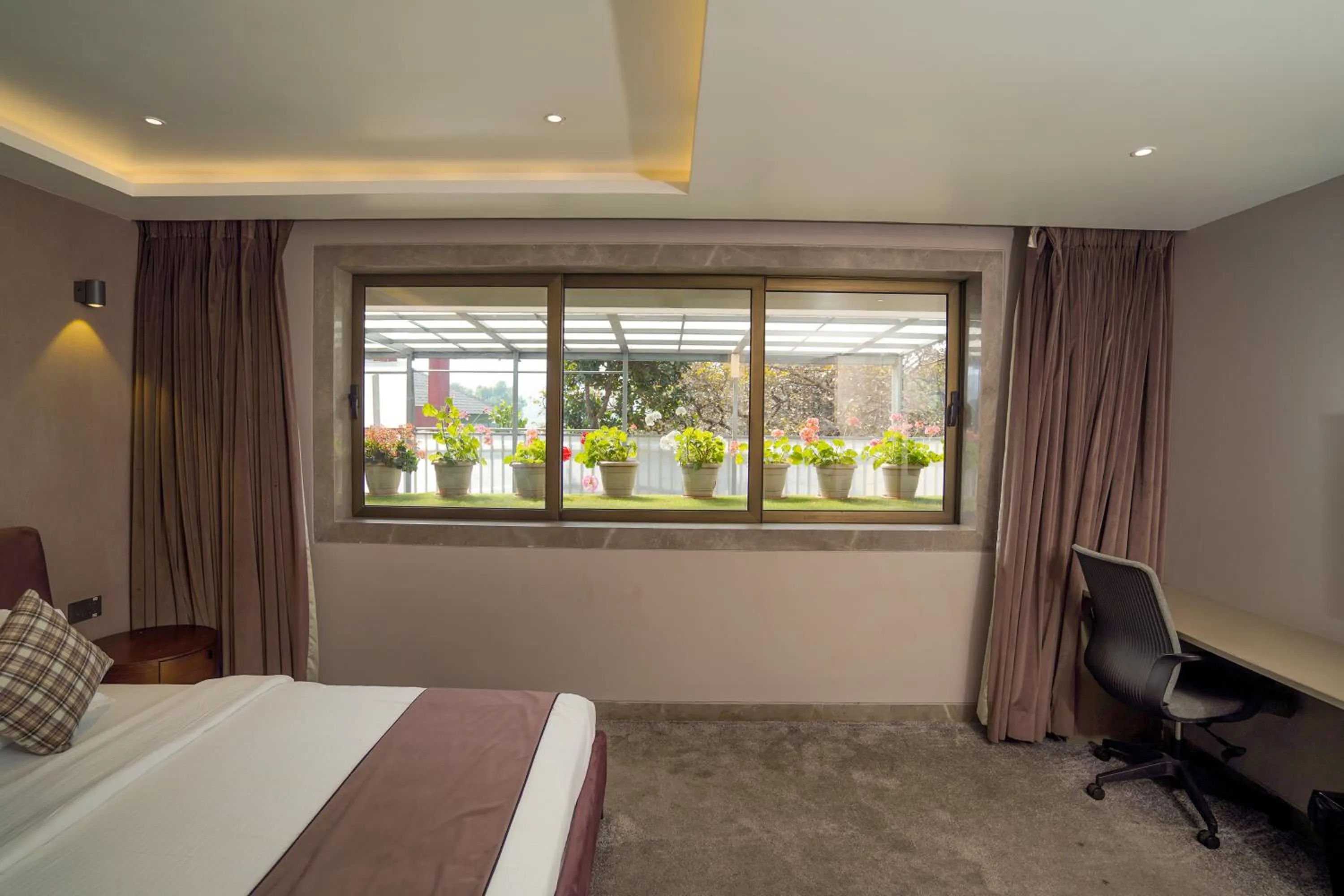 Bed in Leela Resort, The Exotic Boutique Hotel - Pure Veg