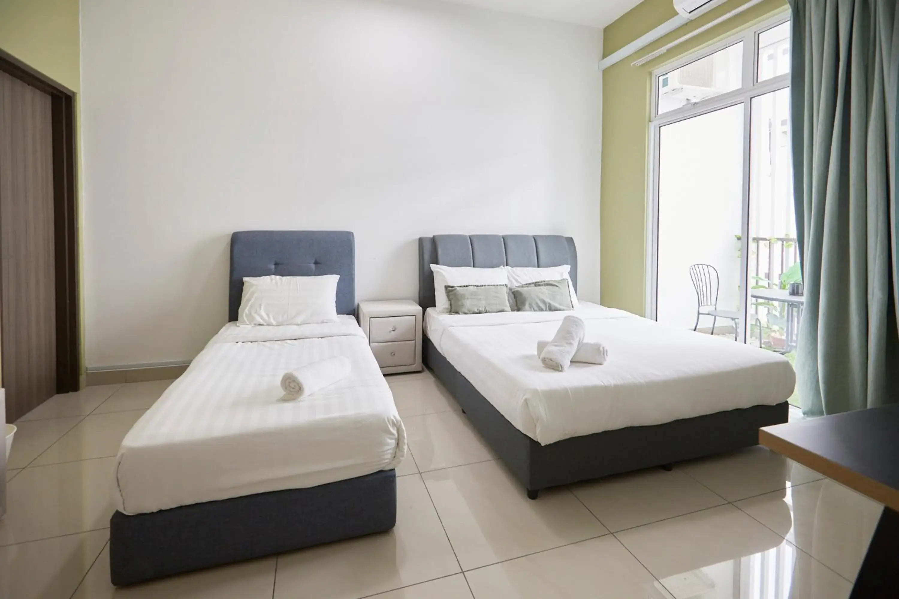 Triple Room with Garden View in Desaru Arcadia Villa By Convergence Triple Room with Garden View in Desaru Arcadia Villa By Convergence