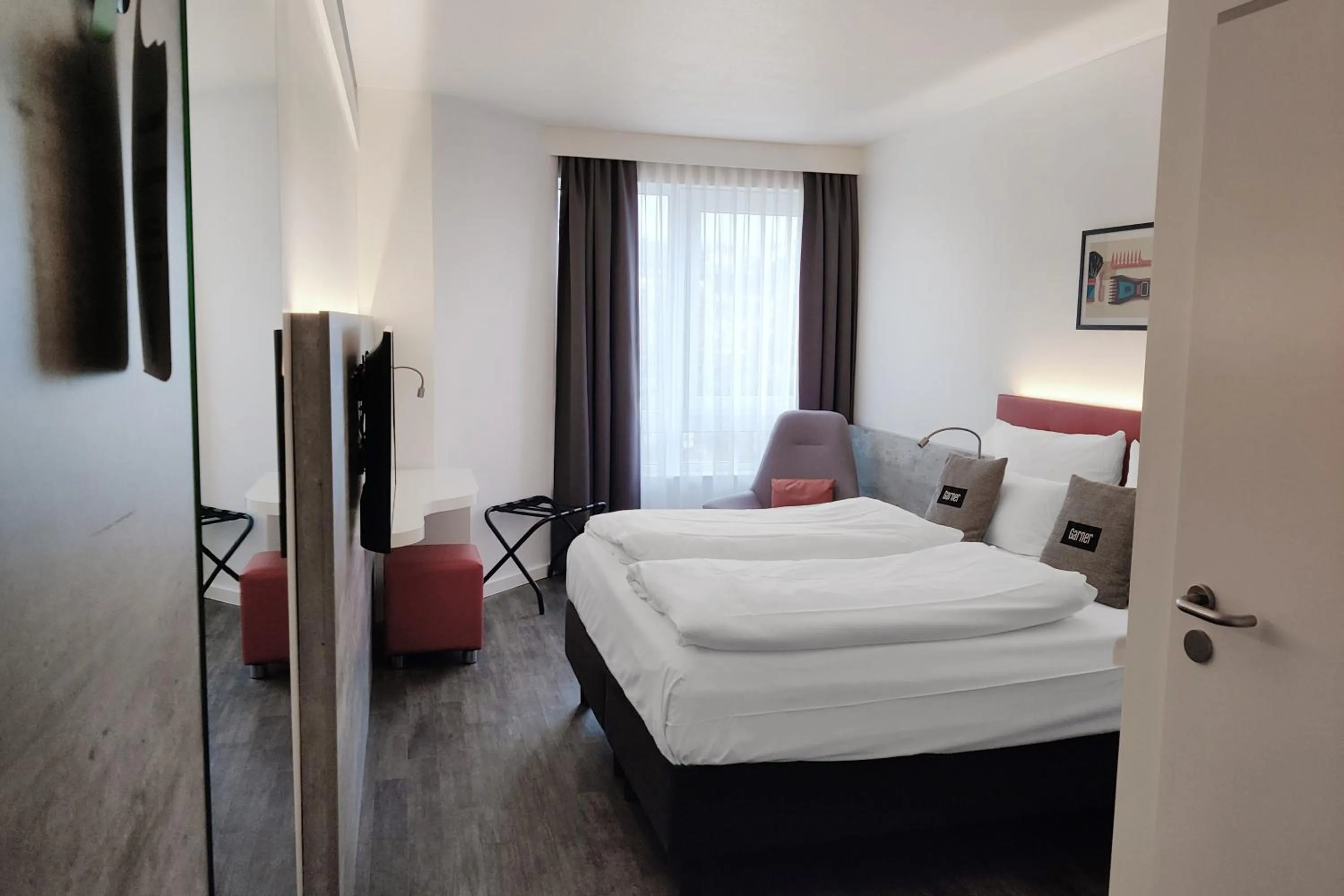 Photo of the whole room, Bed in Garner Hotel Wiesbaden City by IHG