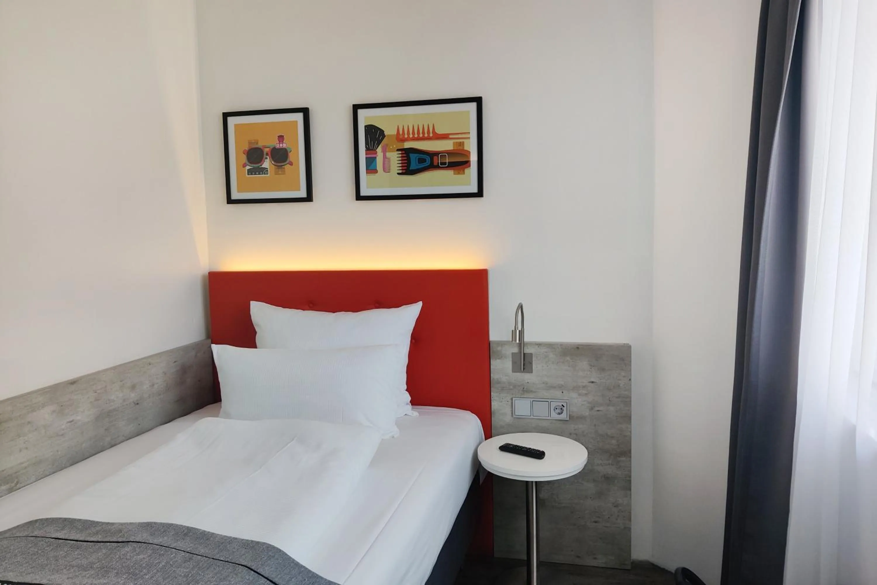 Photo of the whole room, Bed in Garner Hotel Wiesbaden City by IHG