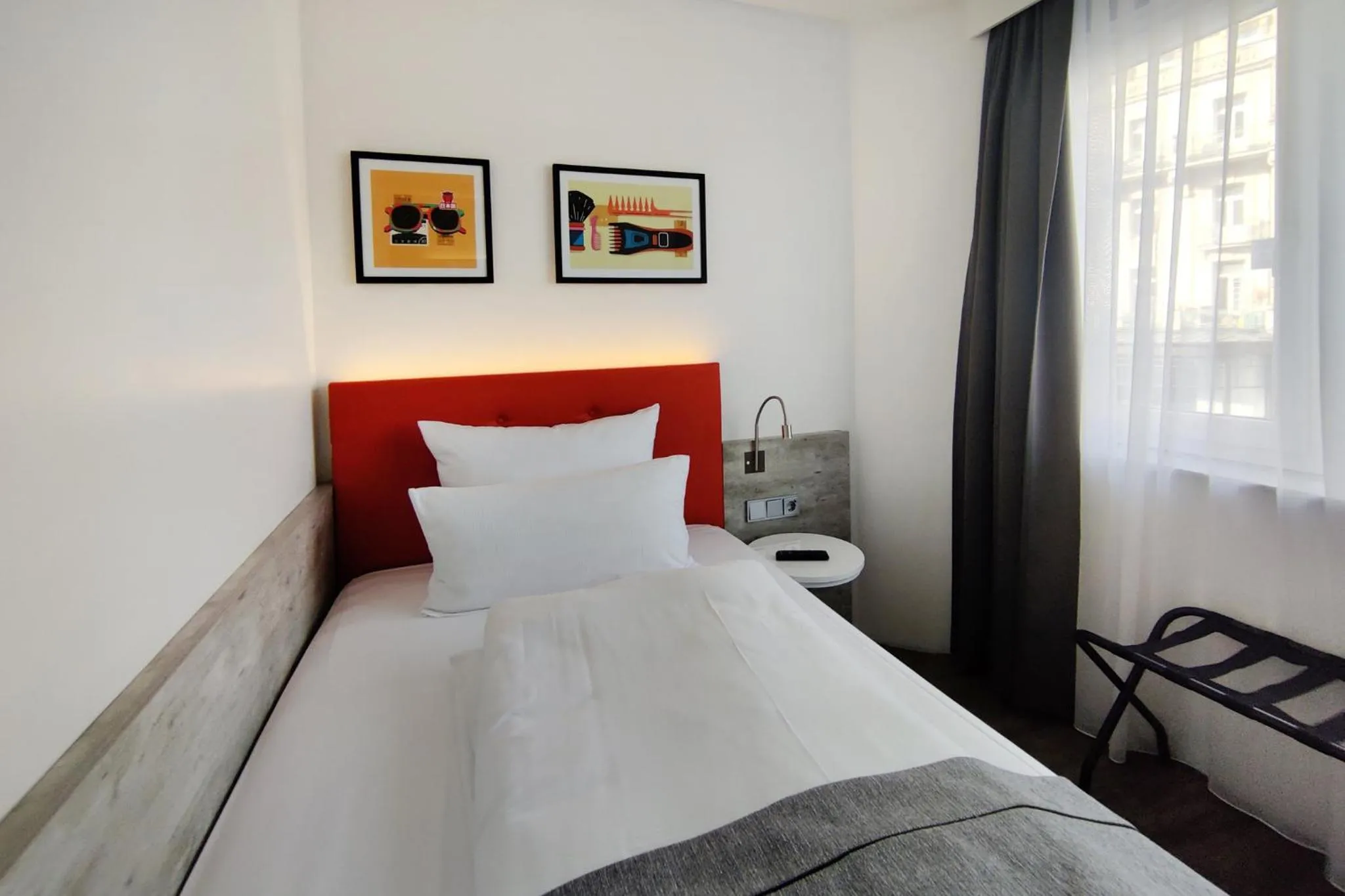 Photo of the whole room, Bed in Garner Hotel Wiesbaden City by IHG