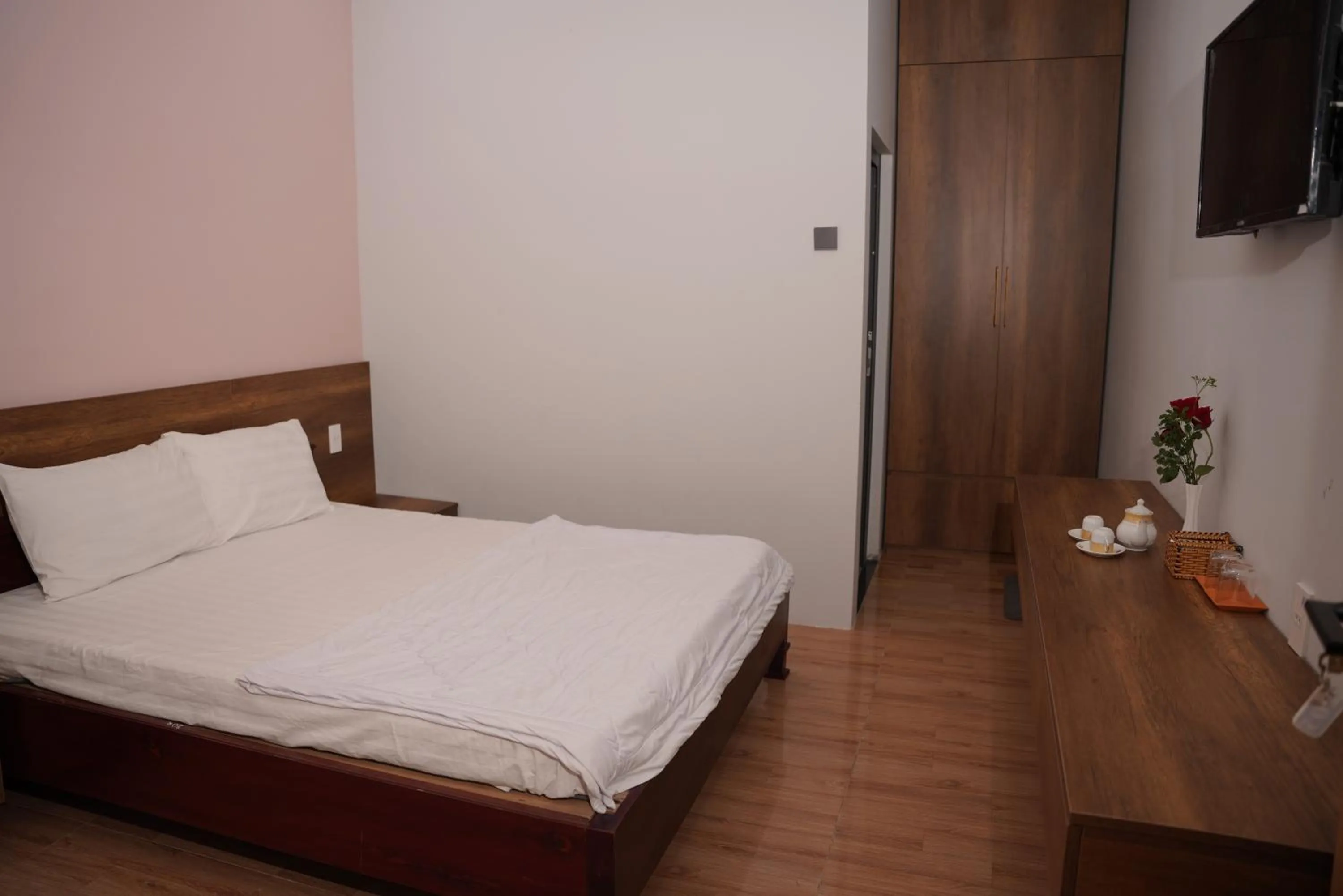 Bed in KHÁCH SẠN ĐẾ VƯƠNG