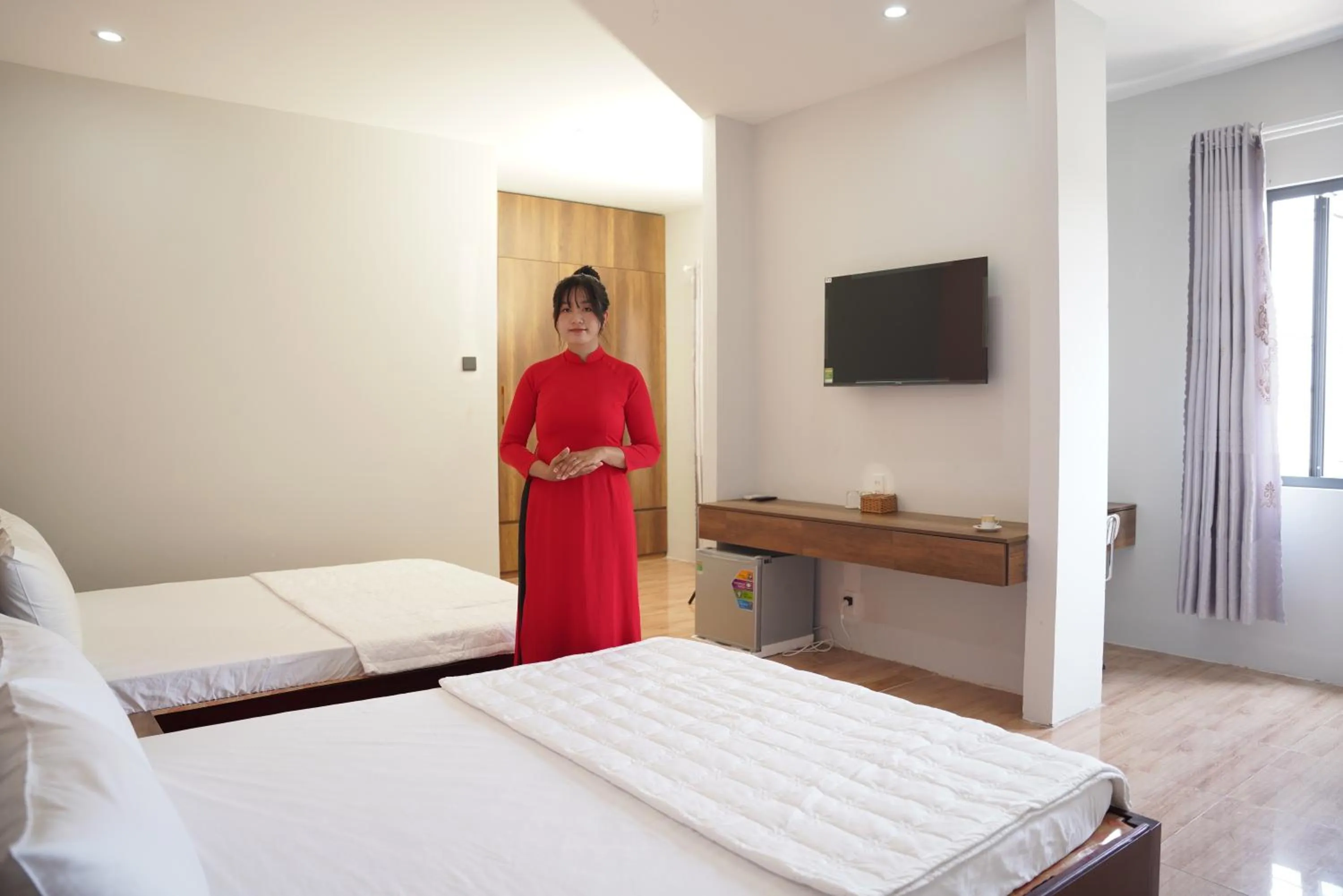 Bed in KHÁCH SẠN ĐẾ VƯƠNG