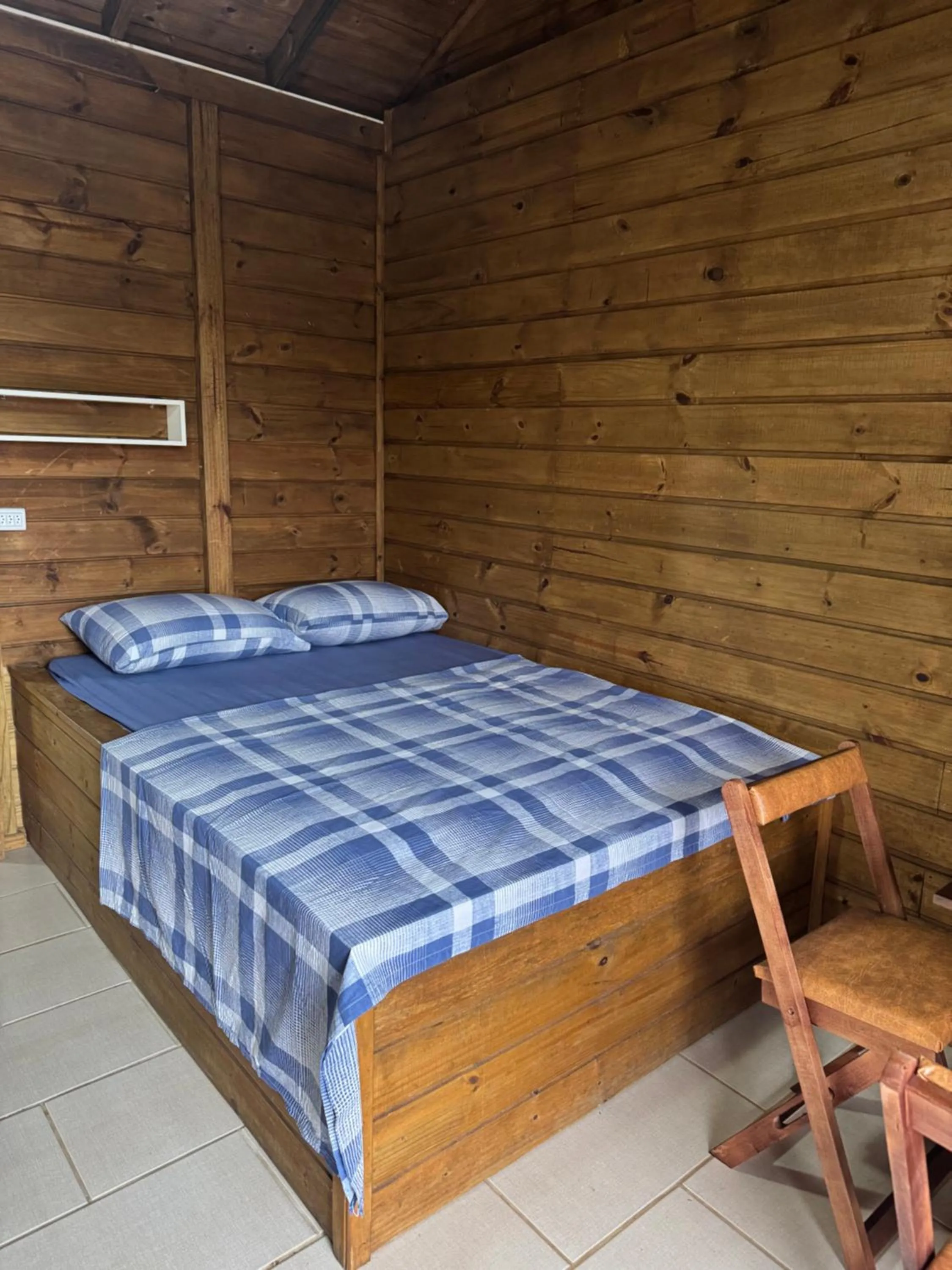 Bed in Pousada Alaia