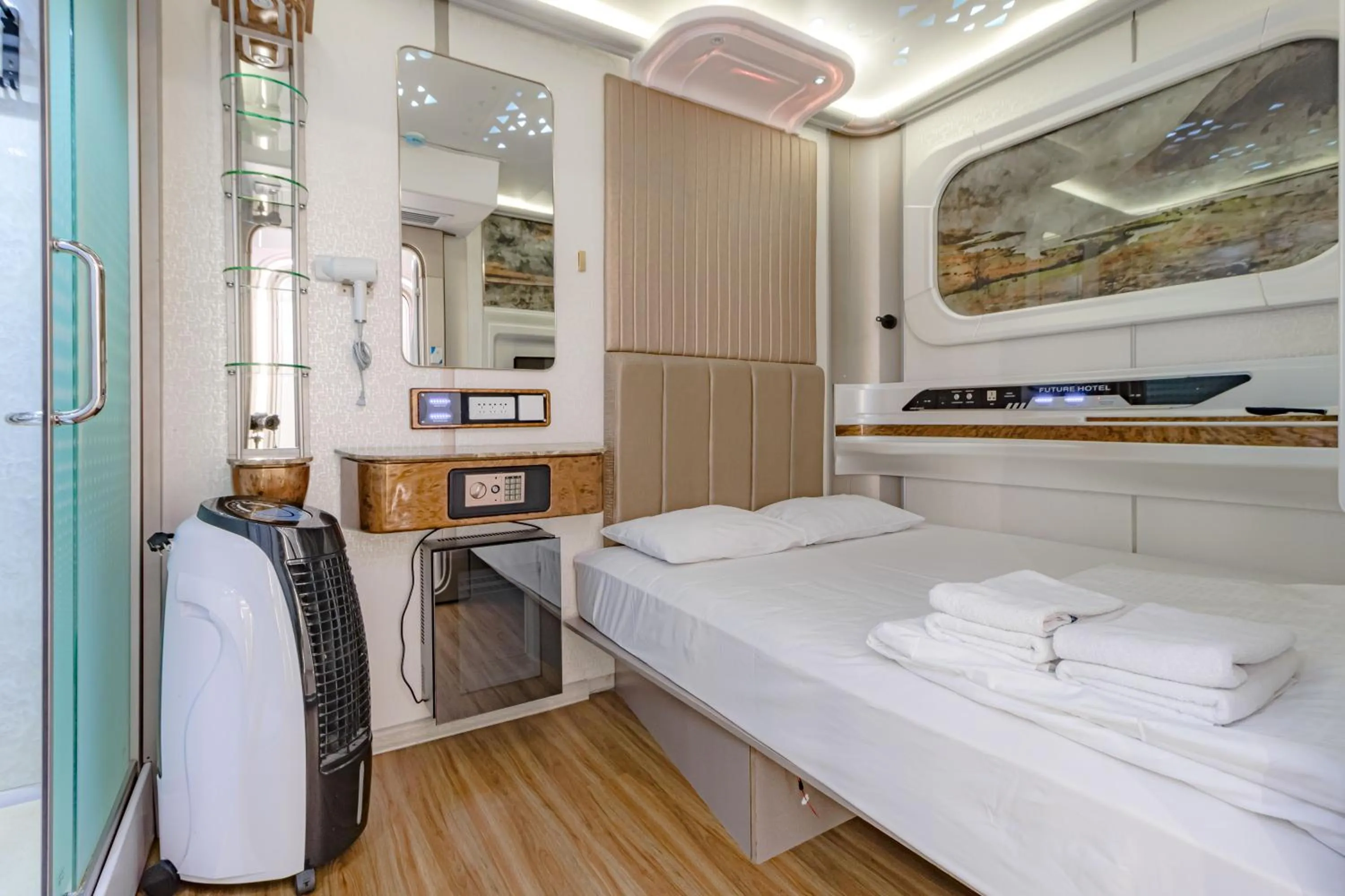 Bed in CAPS LOCK Future Hotel