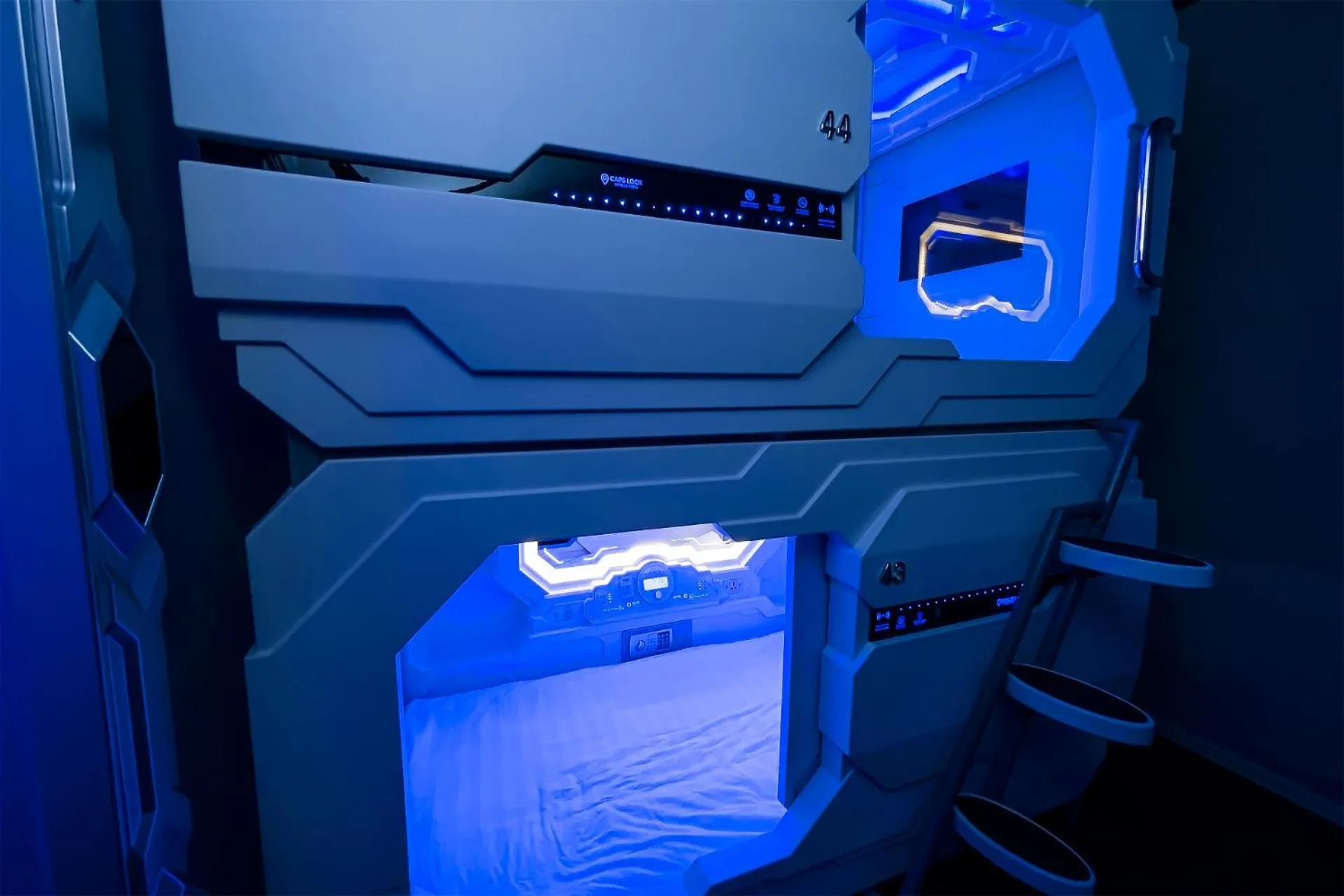 Bed in CAPS LOCK Future Hotel