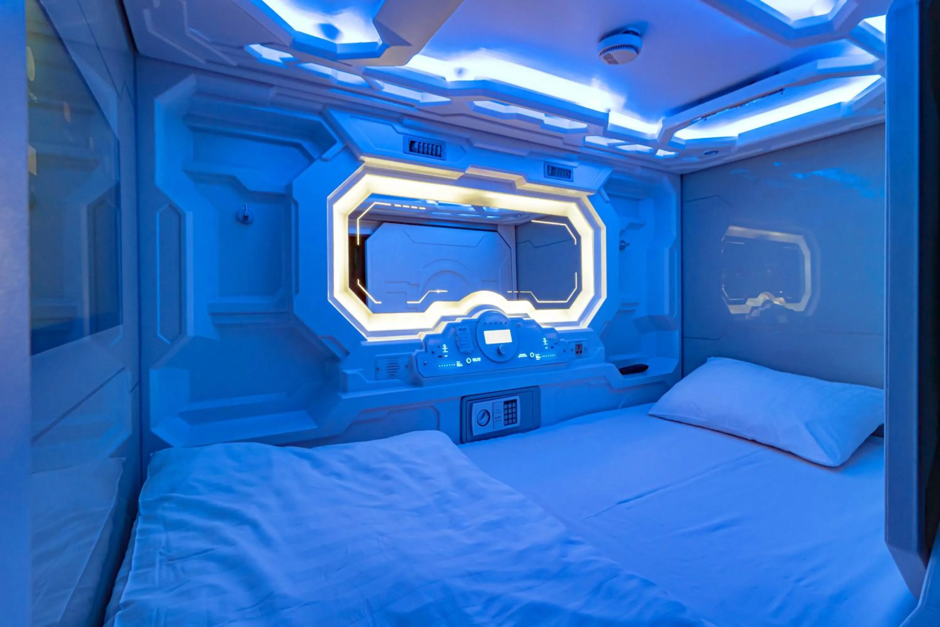 Bed in CAPS LOCK Future Hotel